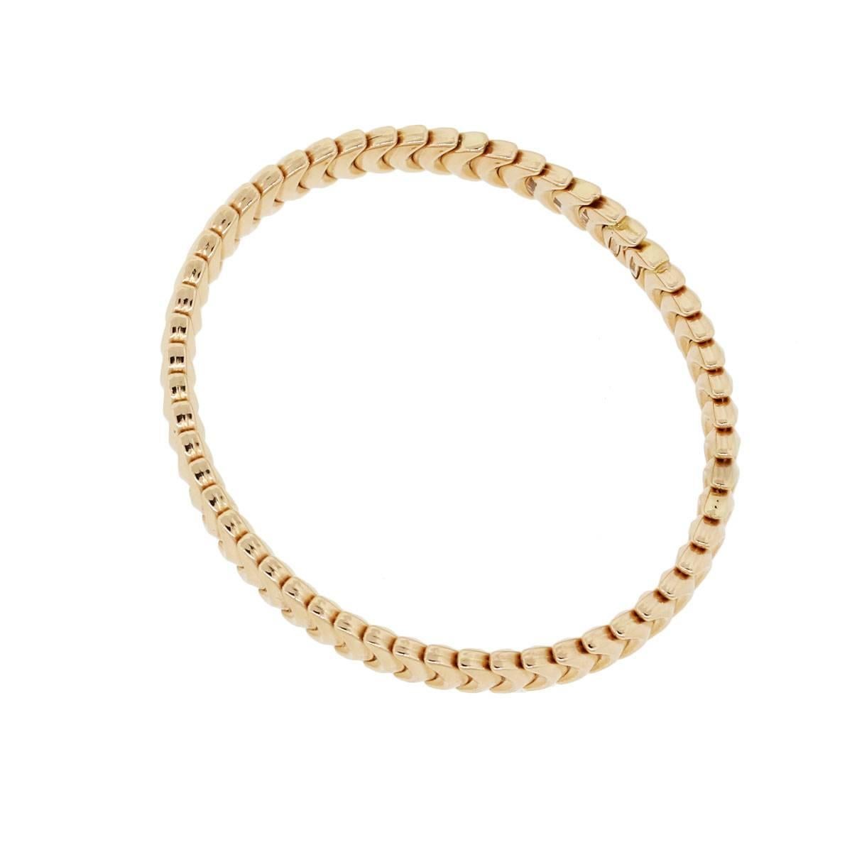 Designer: Chimento
Material: 18k rose gold
Fastening: Open clasp
Measurements: Will fit a 6.25″ wrist
Item Weight: 11.5g (7.4dwt)
Additional Details: This item comes complete with a presentation box!
SKU: G7569