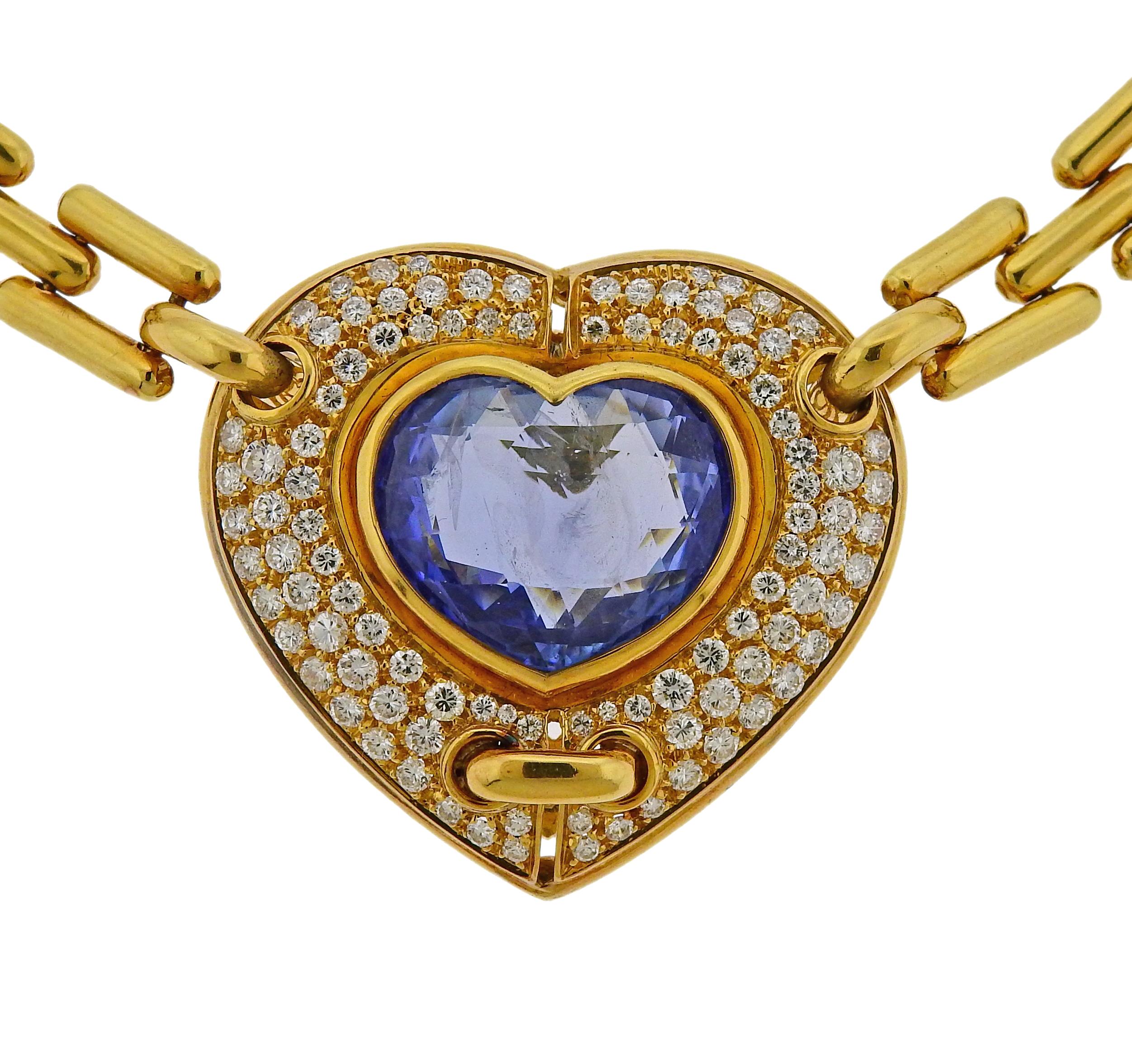 Vintage Chimento 18k gold necklace, set with a heart shaped blue sapphire in the center, surrounded with approx. 2.20ctw in diamonds. Necklace is 17.5