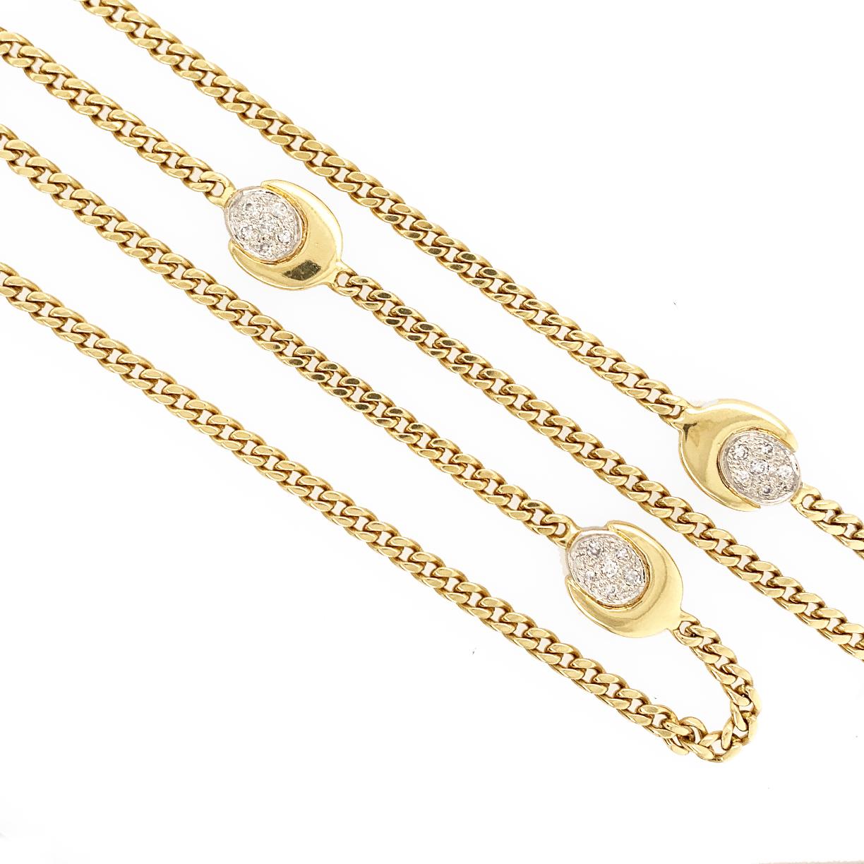 Beautiful link necklace.  Made and signed by Chimento.  Weighty 18K yellow gold,  set with four diamond lunar motifs.  Approximately 1.00 carats in weight.  It measures 35.5