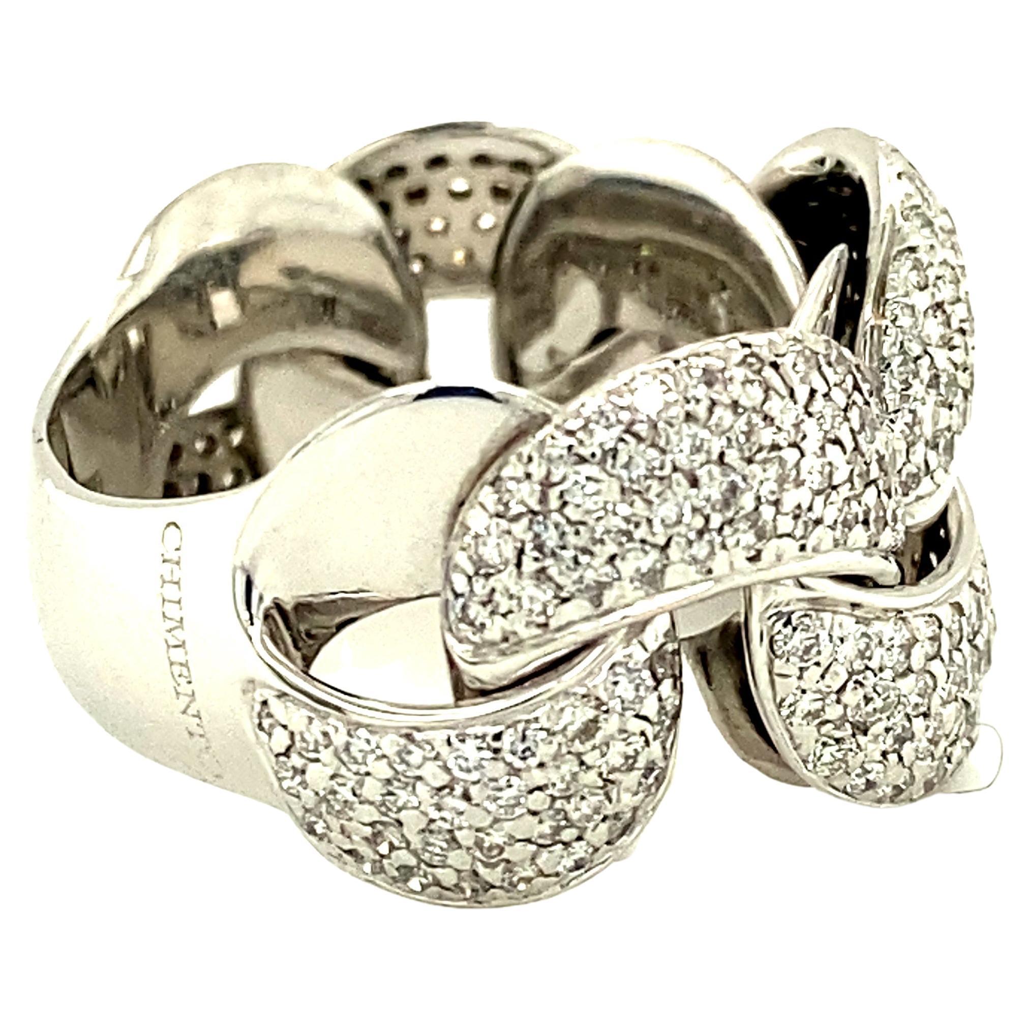 One 18 karat white gold (stamped 780) diamond chain link ring by Chimento, set with approximately 1.67 carat total weight of round brilliant cut diamonds with matching G/H color and SI1 clarity.  The ring is a finger size 9 and can be resized.  