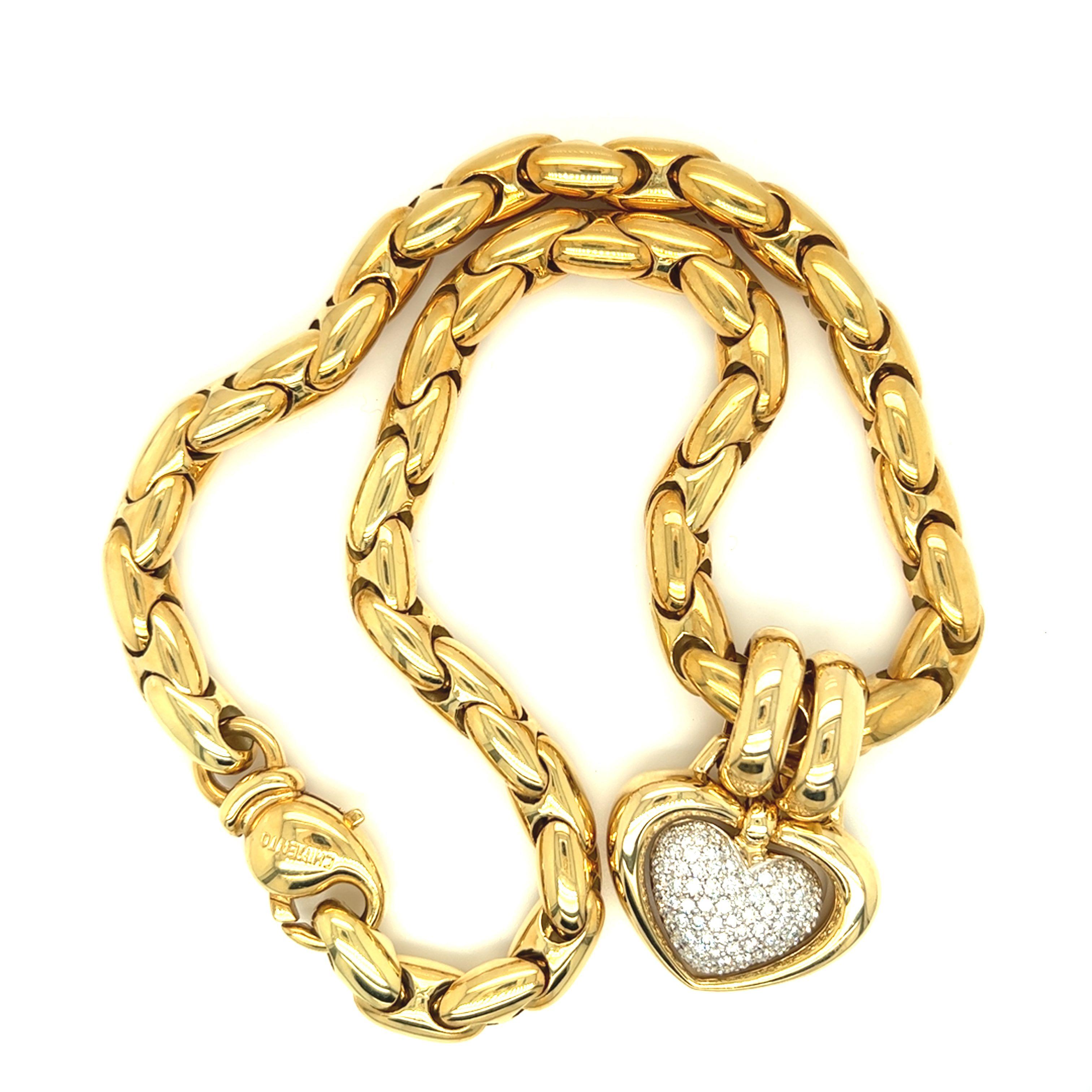 Pavé diamond heart pendant with necklace by Chimento of Vicenza, Italy. The pendant has approximately 2 carats of round brilliant diamond and is encased in a puffy yellow gold surround. There is double connector rings which are quite large (12mm) so