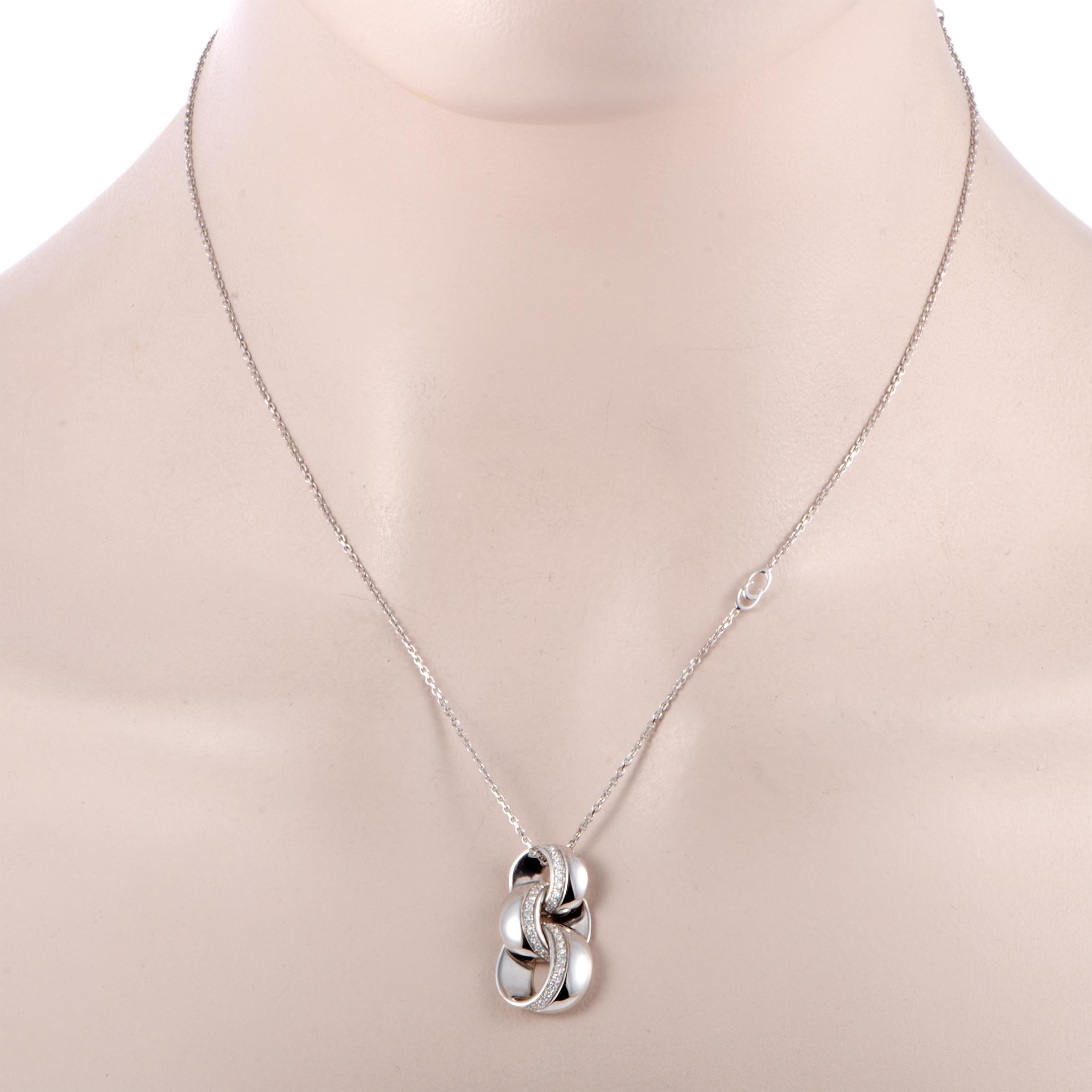 Presented with a beautifully stylized rolo chain onto which an eye-catching, unconventionally designed pendant is attached, this exceptional necklace is a definite head-turner. A Chimento creation, this necklace is masterfully crafted from elegantly