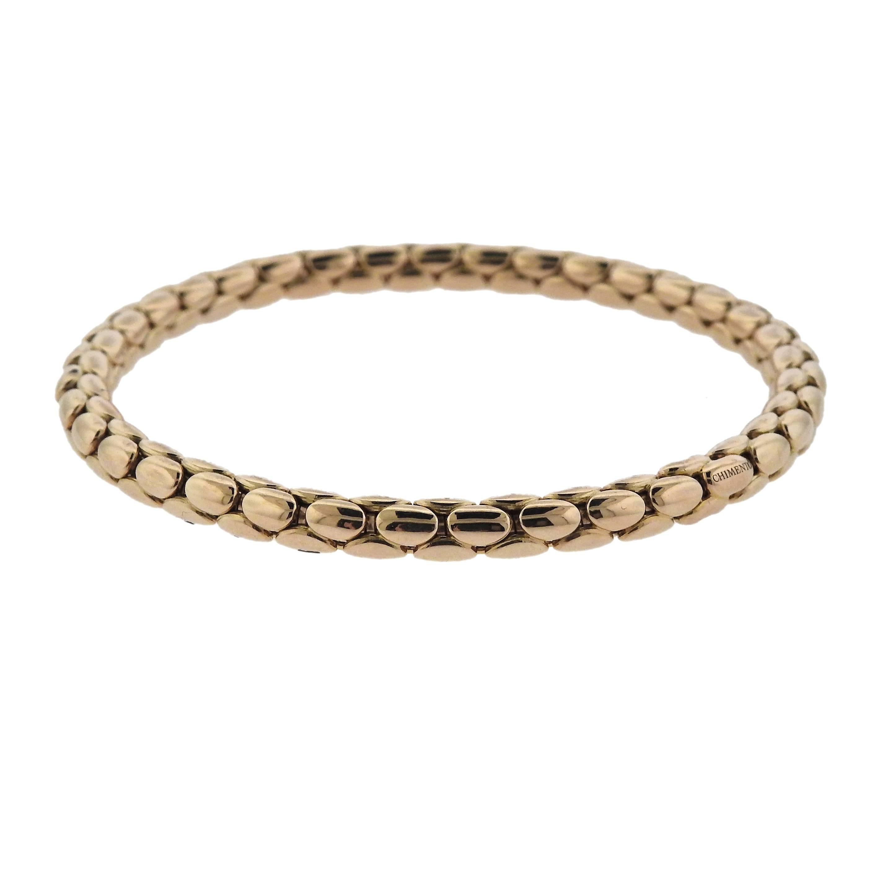 18k rose gold flexible bracelet, crafted by Chimento. Retail $2410.  Bracelet is slightly flexible, pull on design (does not have a clasp). Inner diameter is 56mm, will fit approx. 6.75