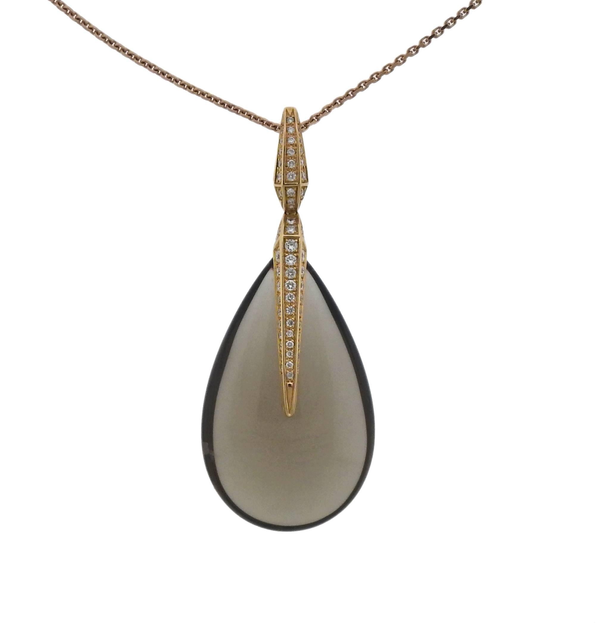 18k gold chain with drop pendant, crafted by Chimento, featuring 36mm x 22mm x 10.2mm smokey quartz, adorned with approx. 0.46ctw in G/VS diamonds. Retail $4220. Necklace is 19.5