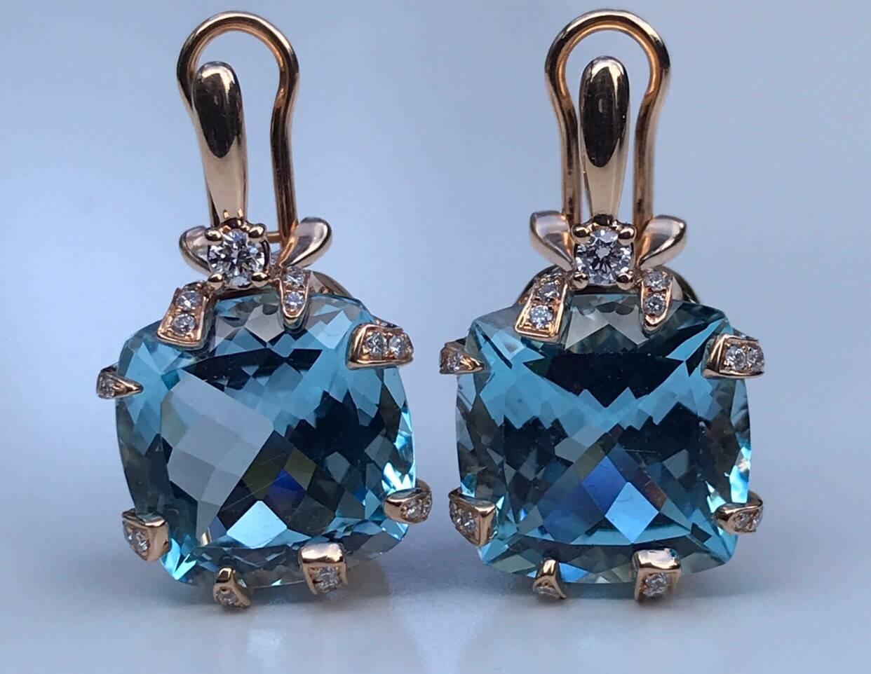 
A pair of Chimento Topaz & Diamond Earrings set in 18k white gold. The earrings each feature a blue topaz of approx   with small brilliant cut diamonds of approx 0.50carat set to a leaver back 18k yellow gold setting.
Measurements: Earrings are