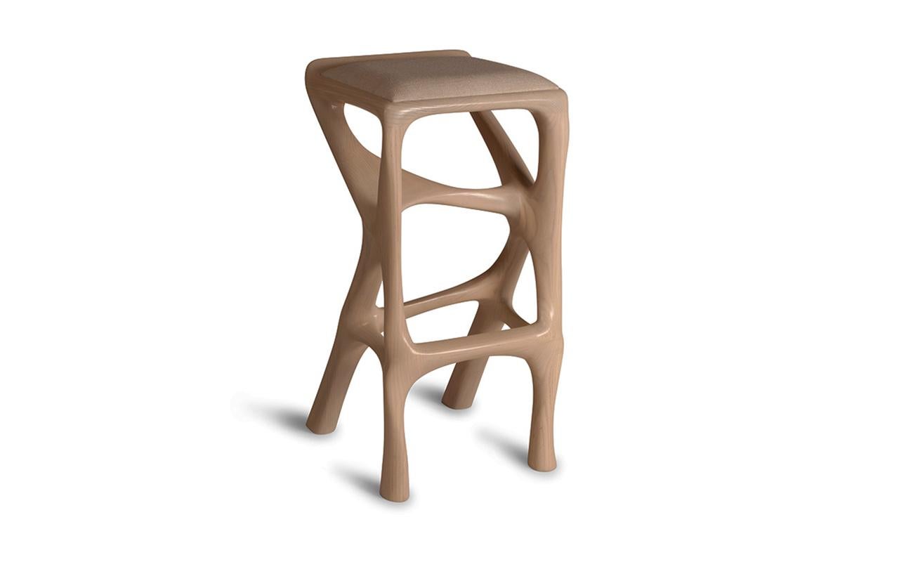 The Chimera Bar Stool by Amorph is a visually stunning and innovative piece of furniture that combines elements of sculpture and functional design. With its dynamic and futuristic form, it adds a touch of modernity and style to any space. The bar