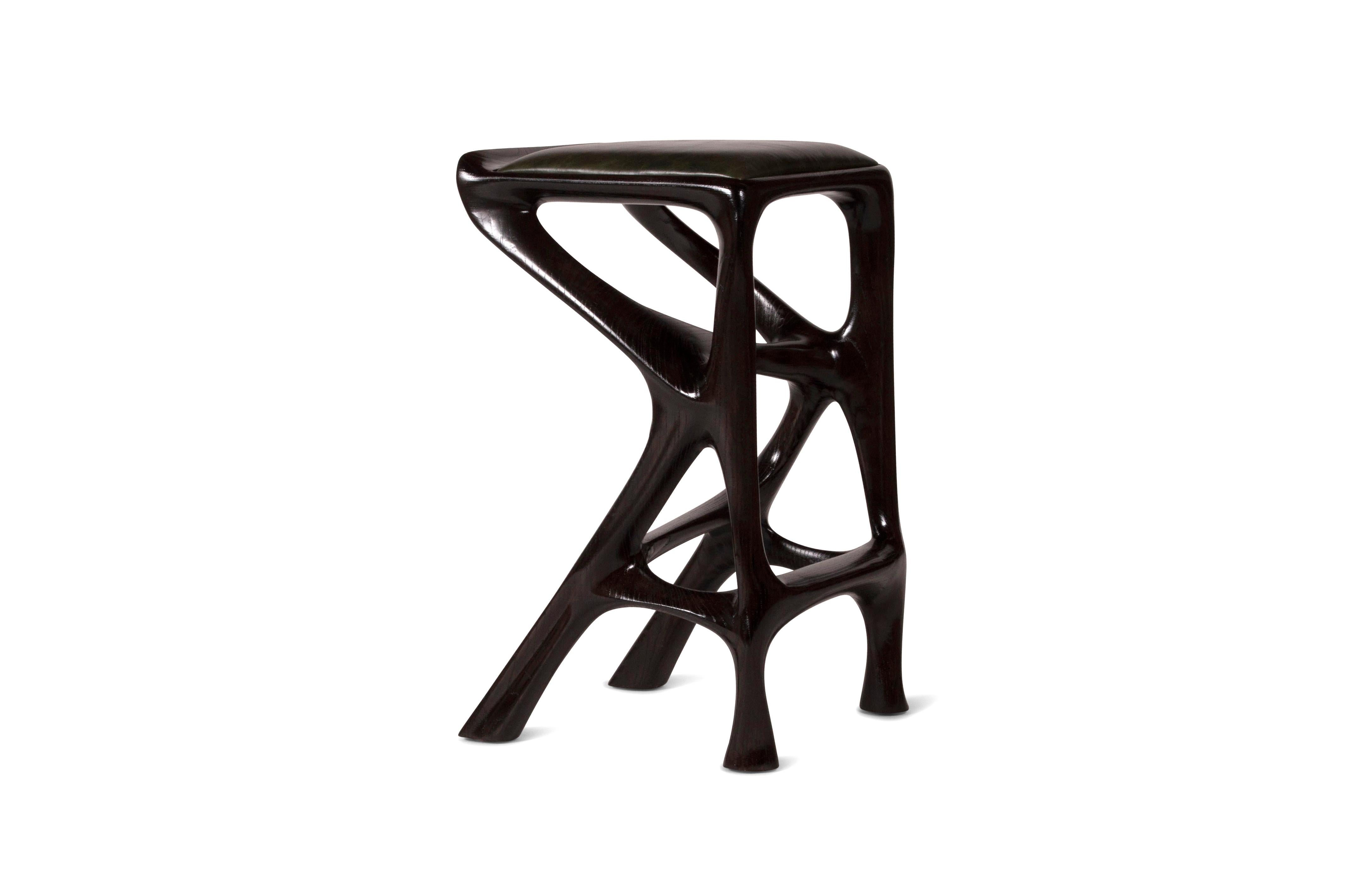 Barstool designed by Amorph made out of solid ashwood and leather. Stain color: Rusted walnut
Dimension 27