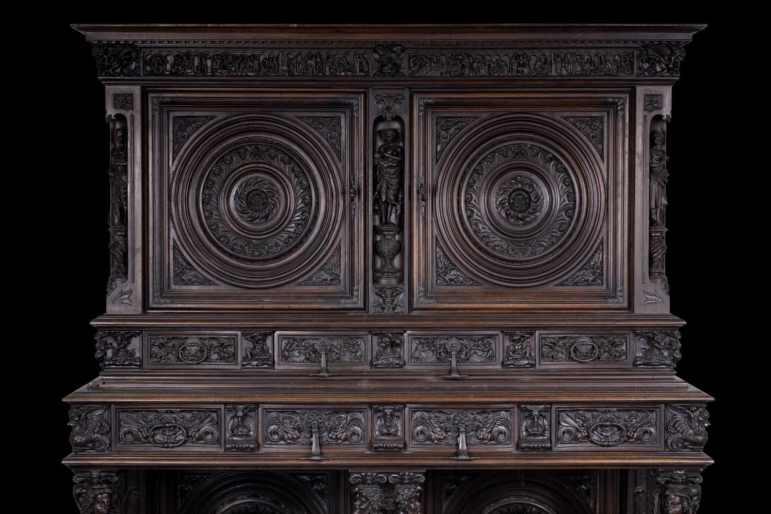 This imposing walnut carved cupboard sideboard is a tour de force of artistic invention and technical mastery. Close to Tuscan Neo-Renaissance production of the second half of the 19th century, this exceptional piece brilliantly blends Renaissance