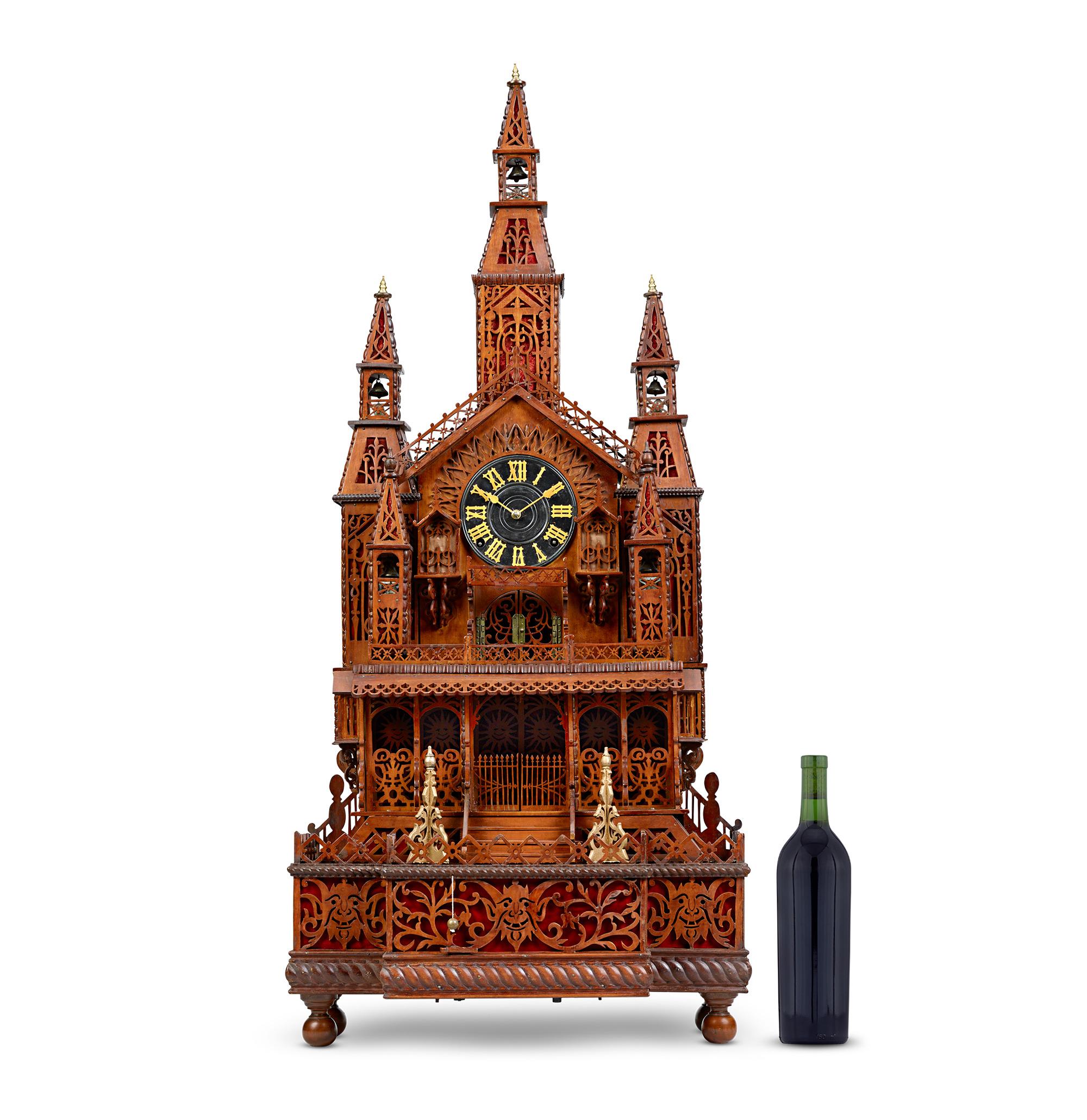 Chimes of Normandy Musical Clock
Early 20th Century

A masterpiece of horology and woodworking, the Chimes of Normandy Clock exemplifies early 20th-century craftsmanship with intricate scroll-saw fretwork. Its dark-stained oak case showcases