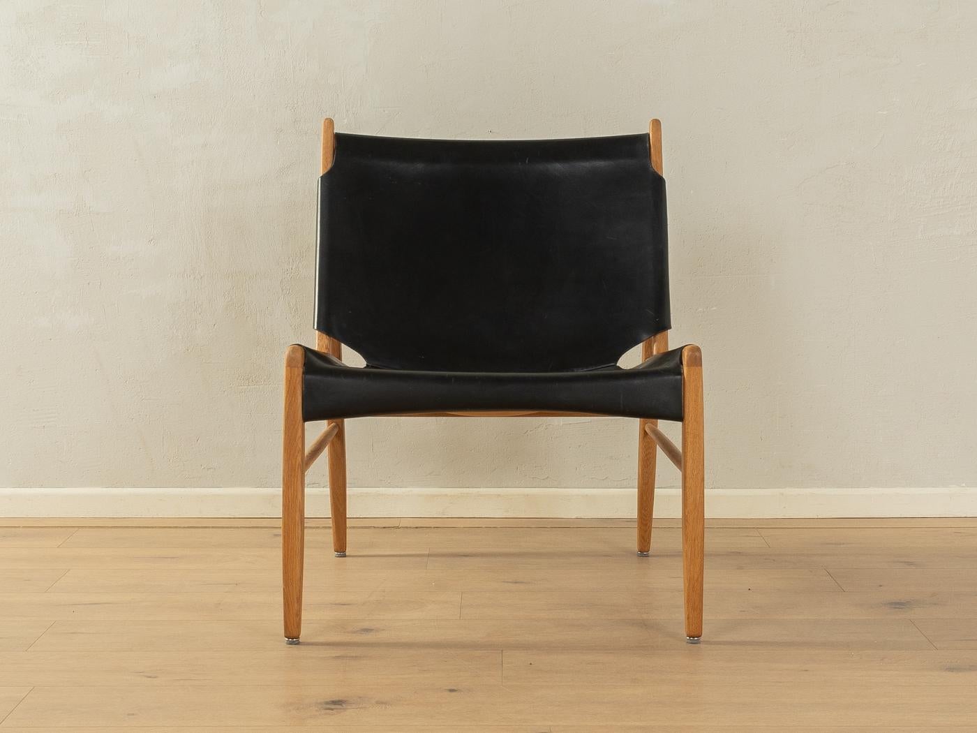 Splendida poltrona, modello 1192, di Franz Xaver Lutz per WK Möbel del 1958. Struttura in rovere massiccio con coperture originali in pelle nera.

Caratteristiche di qualità:

    design accurato: proporzioni perfette e visibile attenzione ai