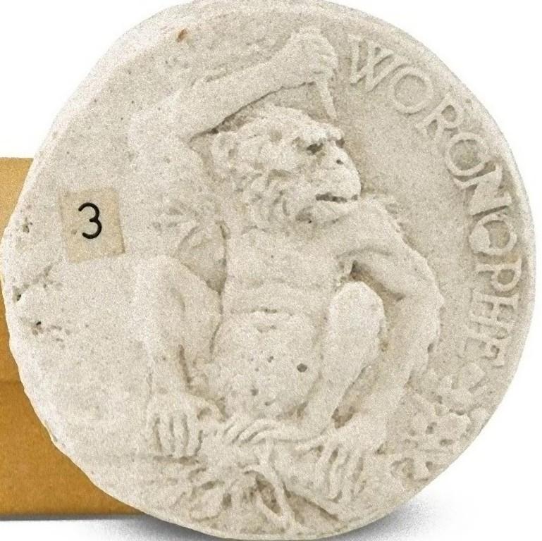 Chimpanzee is an original decorative chalk object realized, realized by an anonymous artist during the 20th century.

This plaster mold for medal represents a chimpanzee holding a small sword.

Box included.

This object is shipped from Italy.