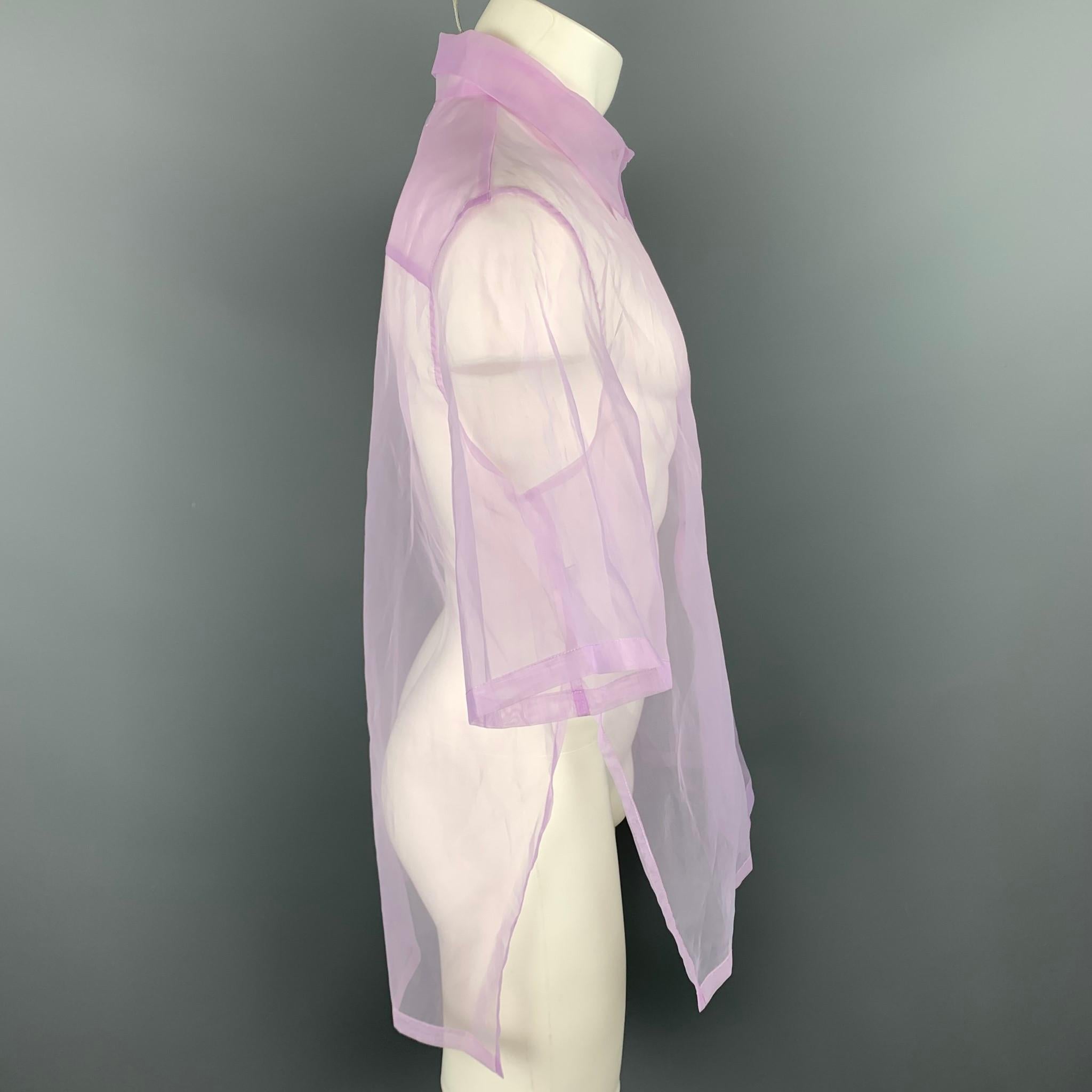 CHIN MENS short sleeve shirt comes in a lavender see through organza featuring a button up style, loose fit, side slits, front pocket, and a spread collar. 

Very Good Pre-Owned Condition.
Marked: M

Measurements:

Shoulder: 18.5 in.
Chest: 44 in.