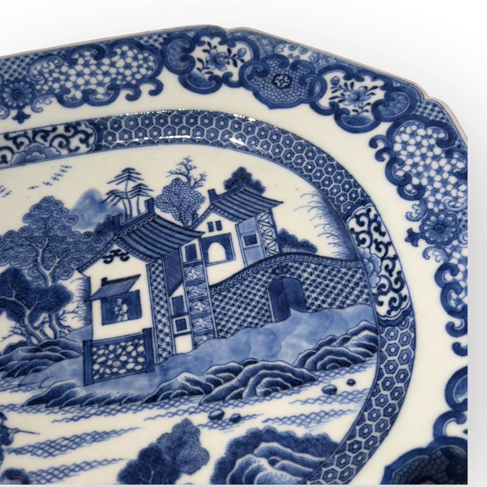 China, 18th Century, Blue-and-White Decorated Dish, circa 1780
This Chinese export porcelain dish, made around 1780 during the reign of Emperor Qianlong (1736-1795), illustrates the excellence of underglaze cobalt blue. Its generous dimensions (38.6