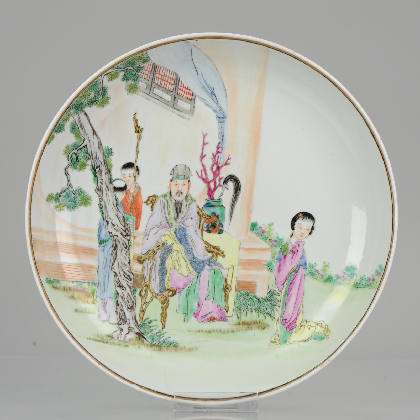 Description

Lovely and good quality dish of larger size.

Visible is a garden pagode scene of two male and two female figures. The person on the chair obviously is the central person in this househould and probabaly is a literati. The tree and