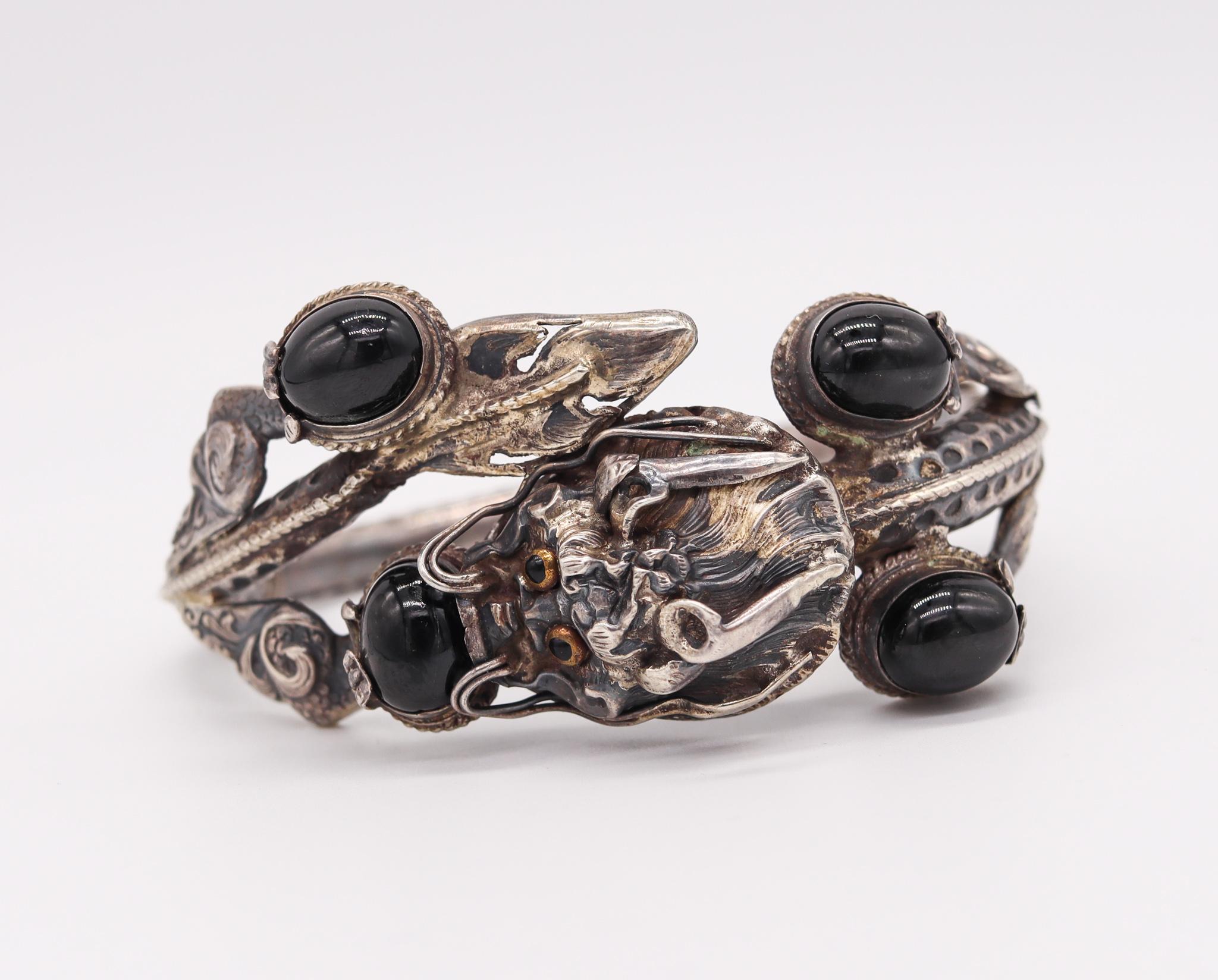 Chinese exportation dragon Victorian bracelet.

Beautiful piece, created in China for exportation during the Qing dynasty period (1644-1911), circa 1900. This three dimensional bracelet has been crafted in the western taste of the Victorian era