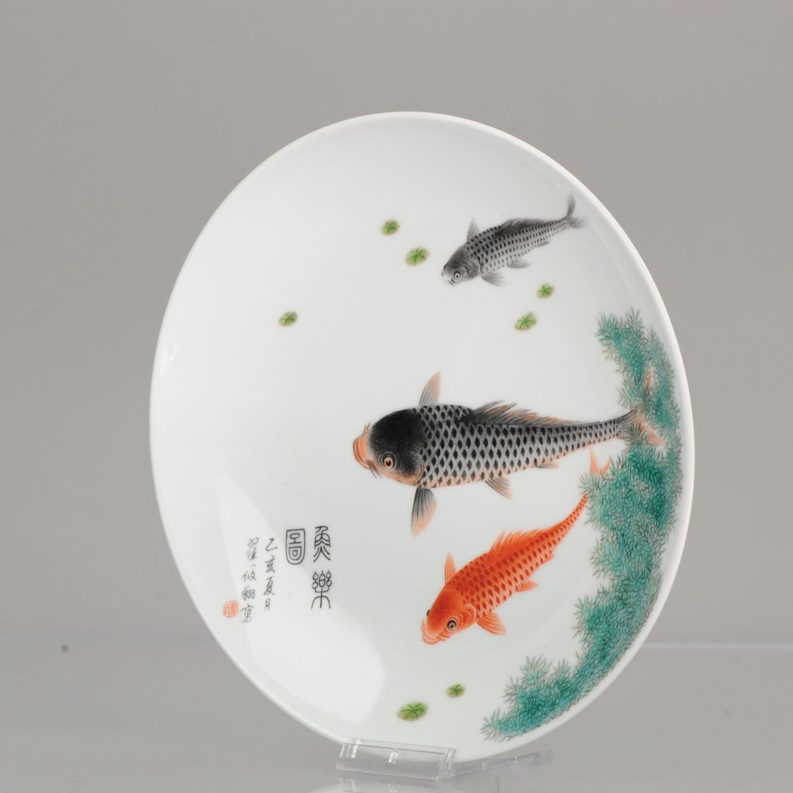 Zhai Xiaoxiang,

Comprising: a dish enameled with three carp swimming in a lotus pond, dated to the Dinghai year (AD1995)

Provenance:

Ex. Peter Wain

Ex. Bonhams

Condition
/ / Overall condition perfect. Size 215 x 23mm

Period
20th
