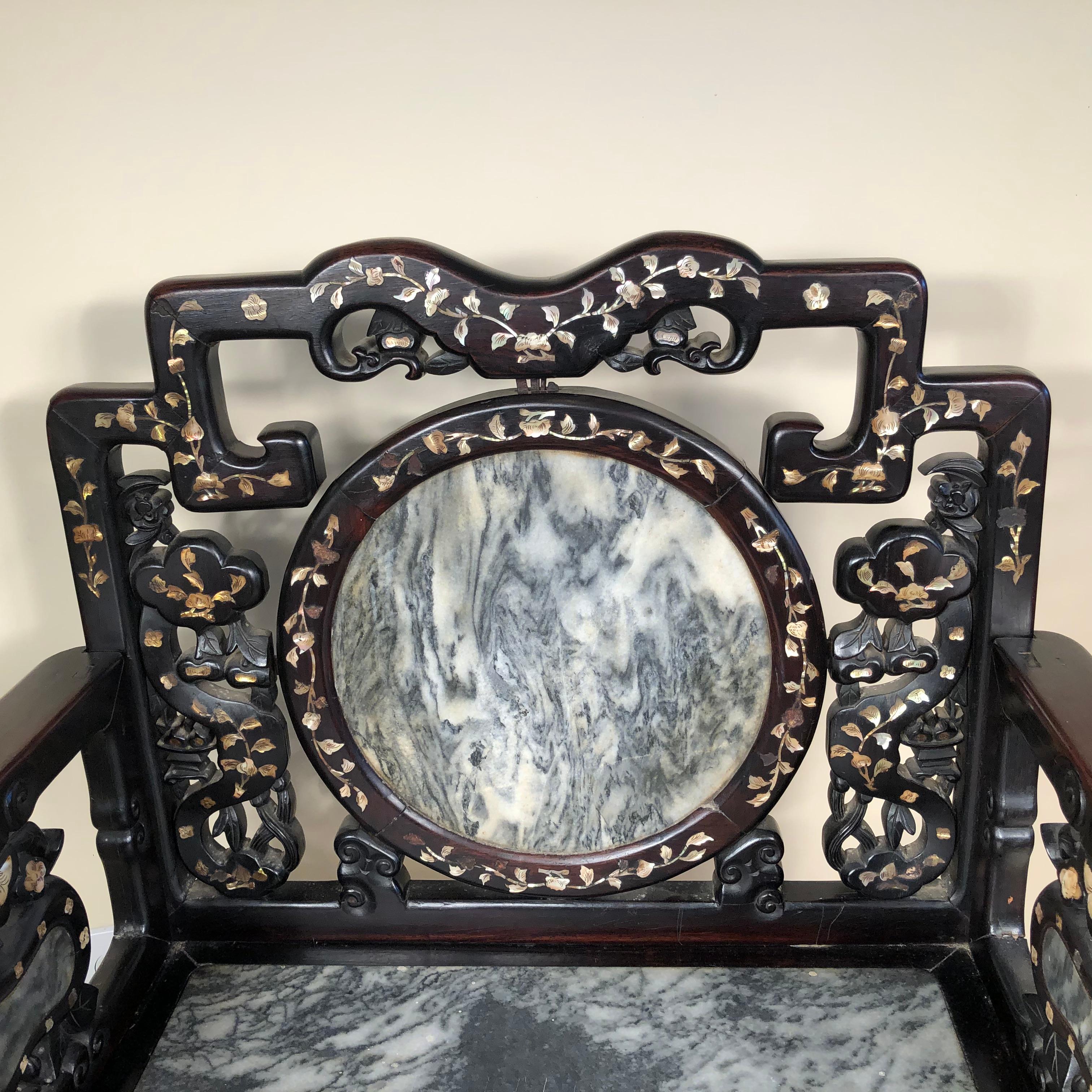 Finest Quality Dreamstone Inlaid Chair

China- an extraordinary prolifically crafted example of an antique hand carved hardwood chair inlaid with multiple natural dream stone 