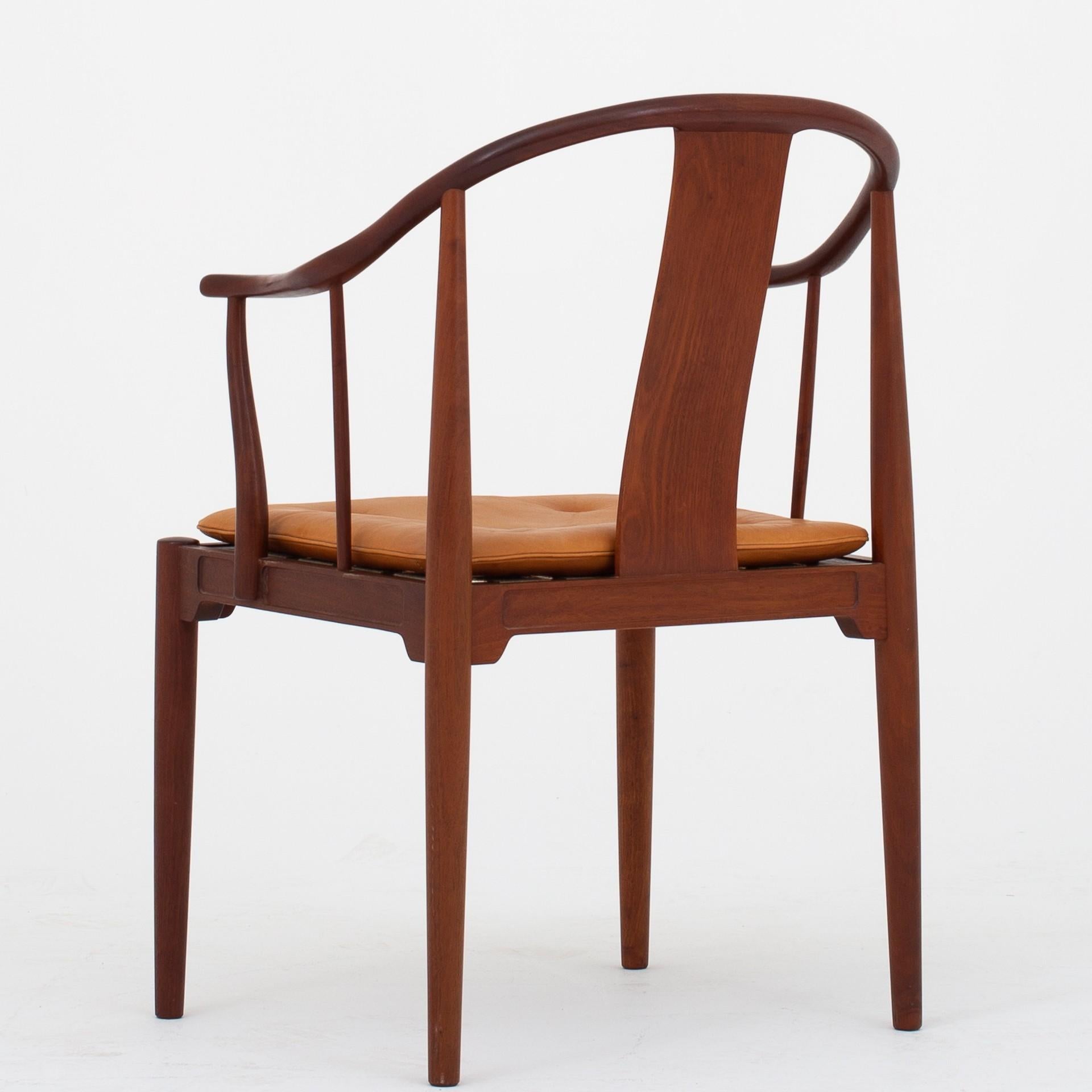 FH 4282 - China chair in Cuban mahogany with cushion of patinated natural leather. (Jubilee model no. 230/400) from 1975. Maker Fritz Hansen.