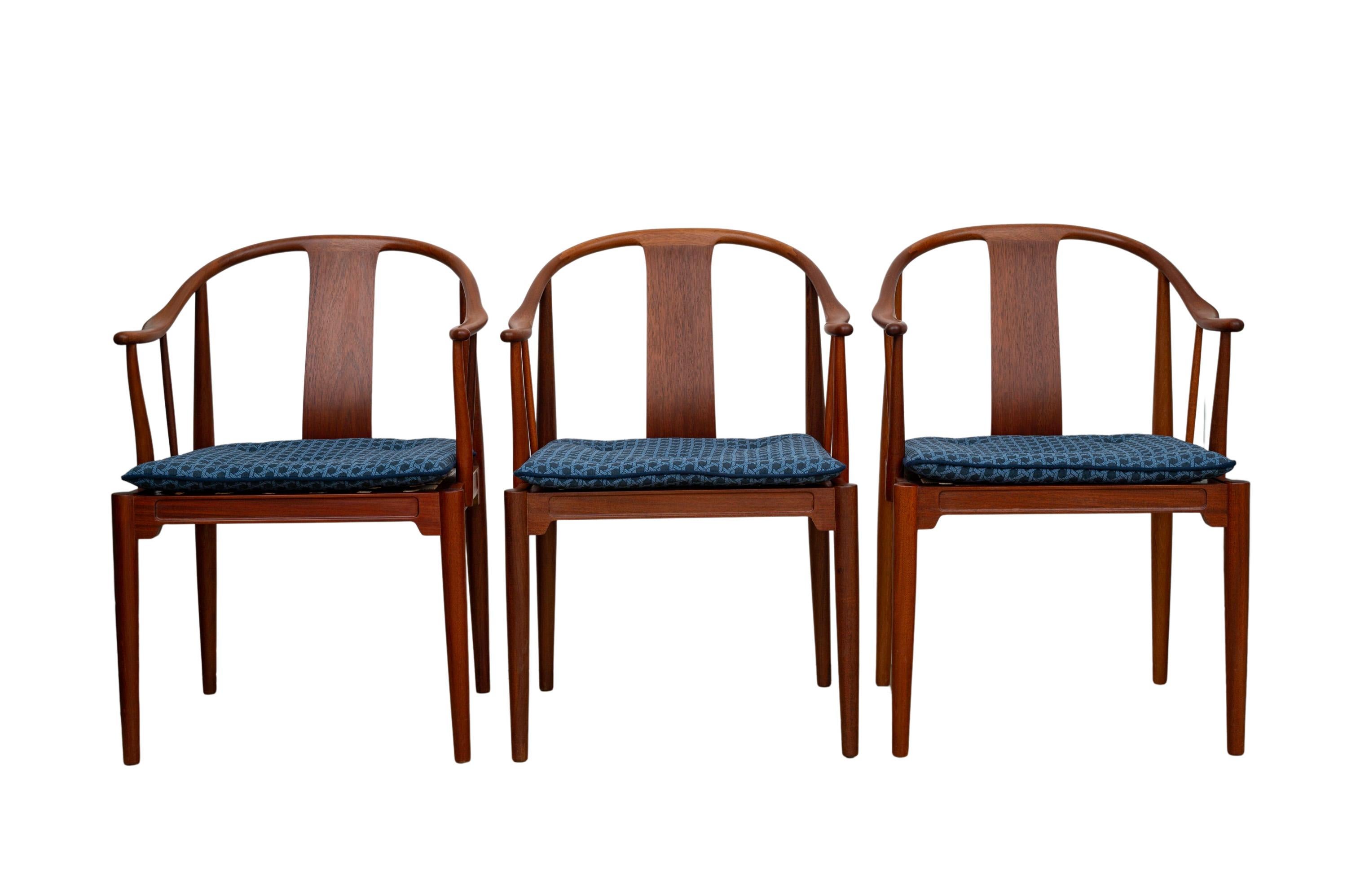 3 China chairs, designed by Hans J. Wegner, executed by Fritz Hansen, 1981, mahogany, cushions reupholstered

The 