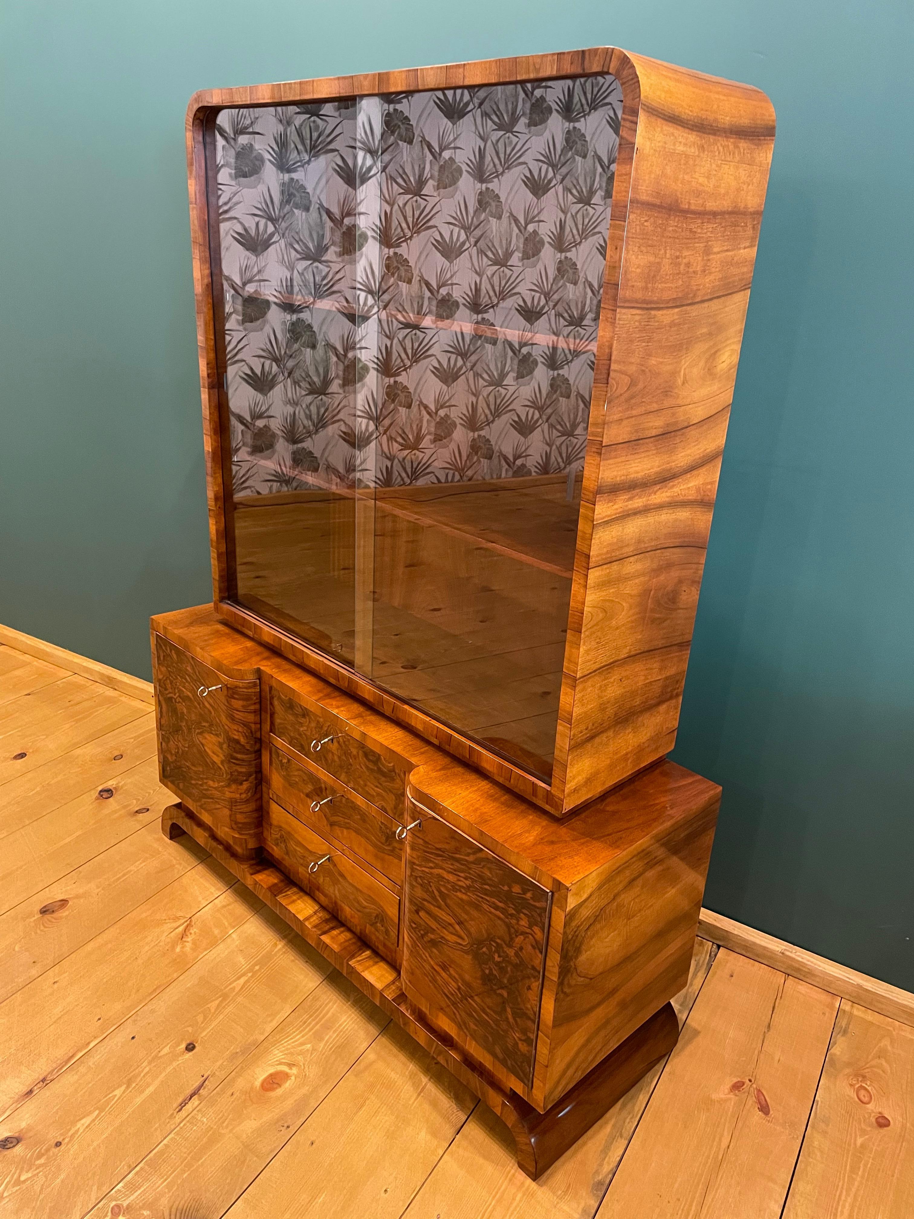 

It has been cleaned to bare veneer, disinfected and finished by hand with high gloss shellac polish.

Every piece of furniture that leaves our workshop from the beginning to the end is subjected to manual renovation, so as to restore its original