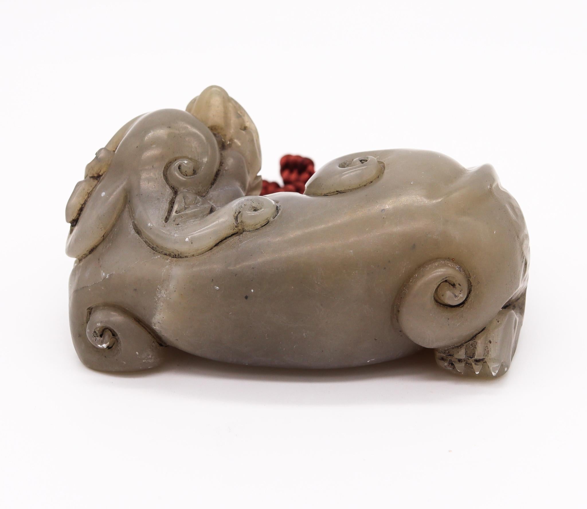 Hand-Carved China Qing Dynasty 19th Century Reclining Foo Dog Statue Carved in Gray Jade
