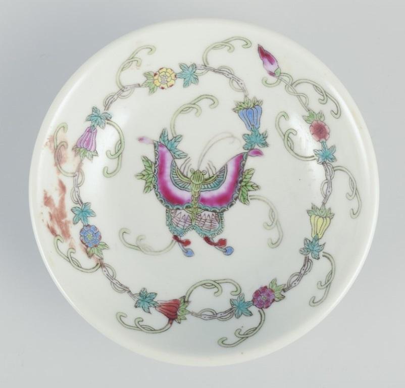 Chinese China, three porcelain bowls. Classic motifs with flowers and butterflies. For Sale