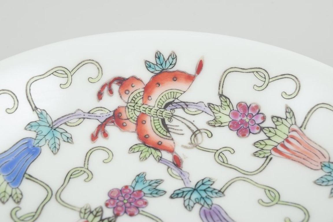 20th Century China, three porcelain bowls. Classic motifs with flowers and butterflies. For Sale