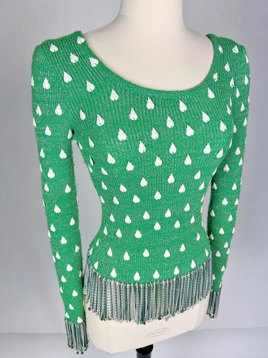 Pull en laine chinée avec franges en lurex et chaîne par Loris Azzaro - France C. C. 1990 Pour femmes en vente