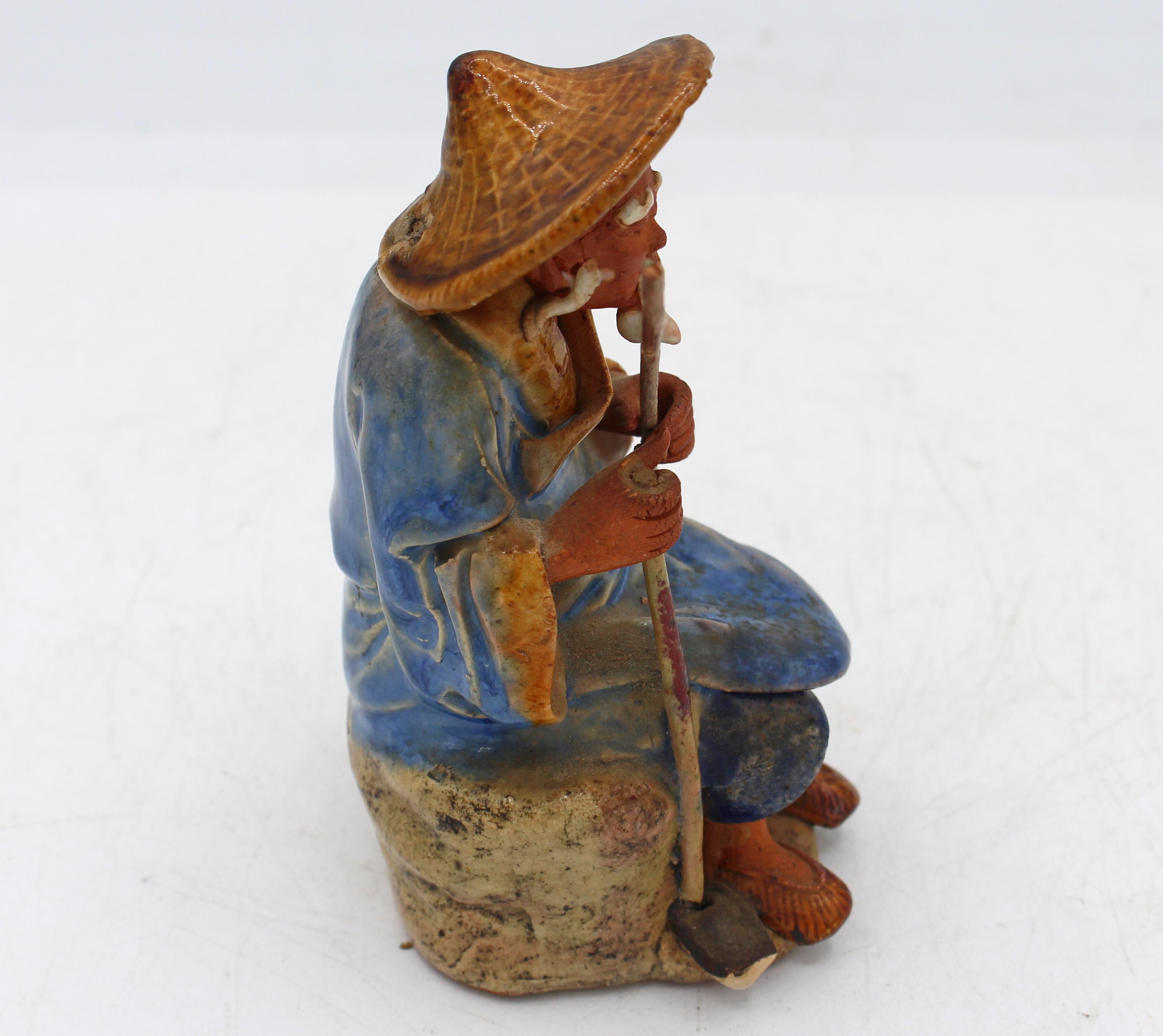 XIX secolo Souvenir dell'Esposizione Universale Cinese del 1891-1911: figura di anziano contadino seduto e uomo di fango in vendita