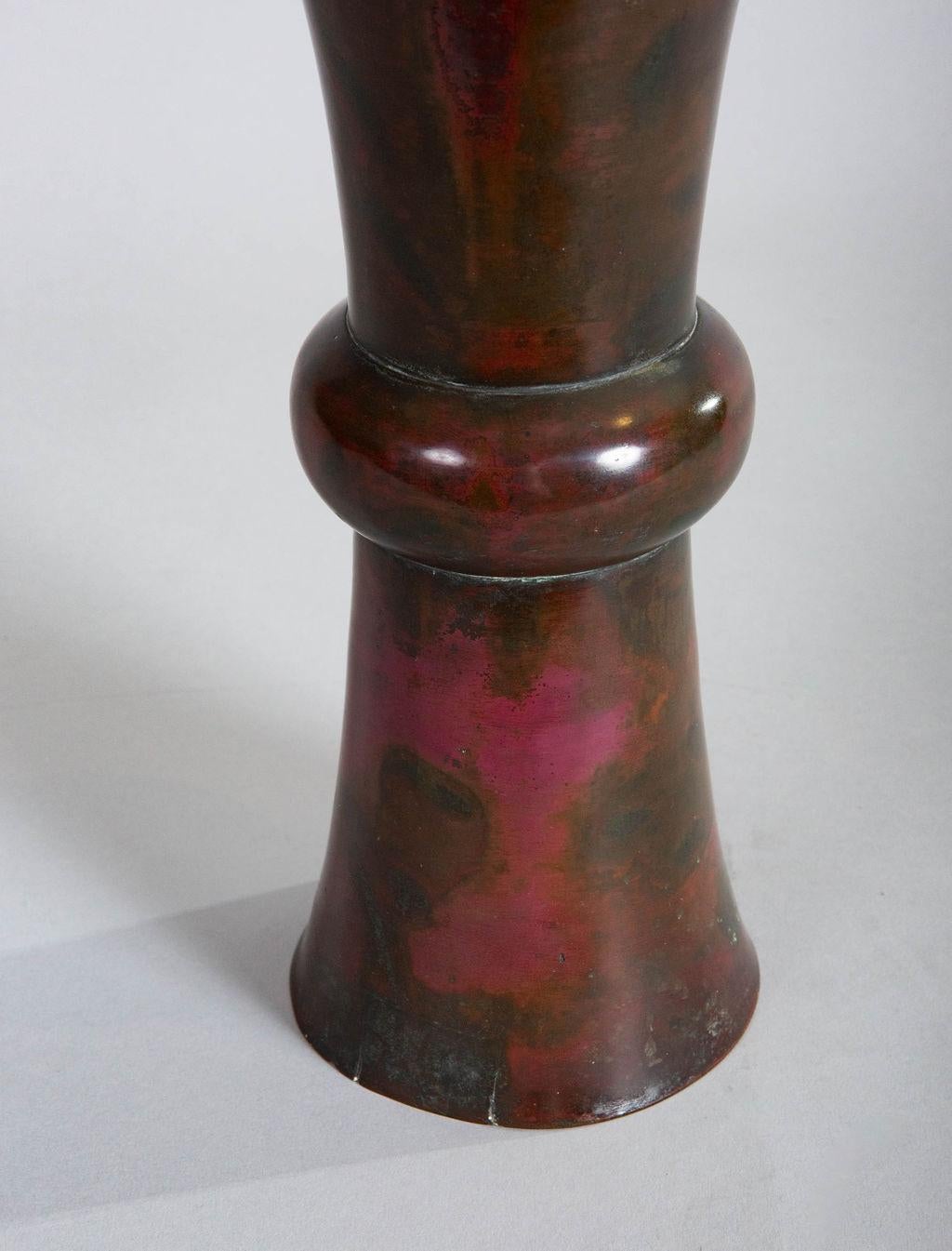 Chinese 18th century bronze vase with mottled patina. Evidence of a small, old repair.