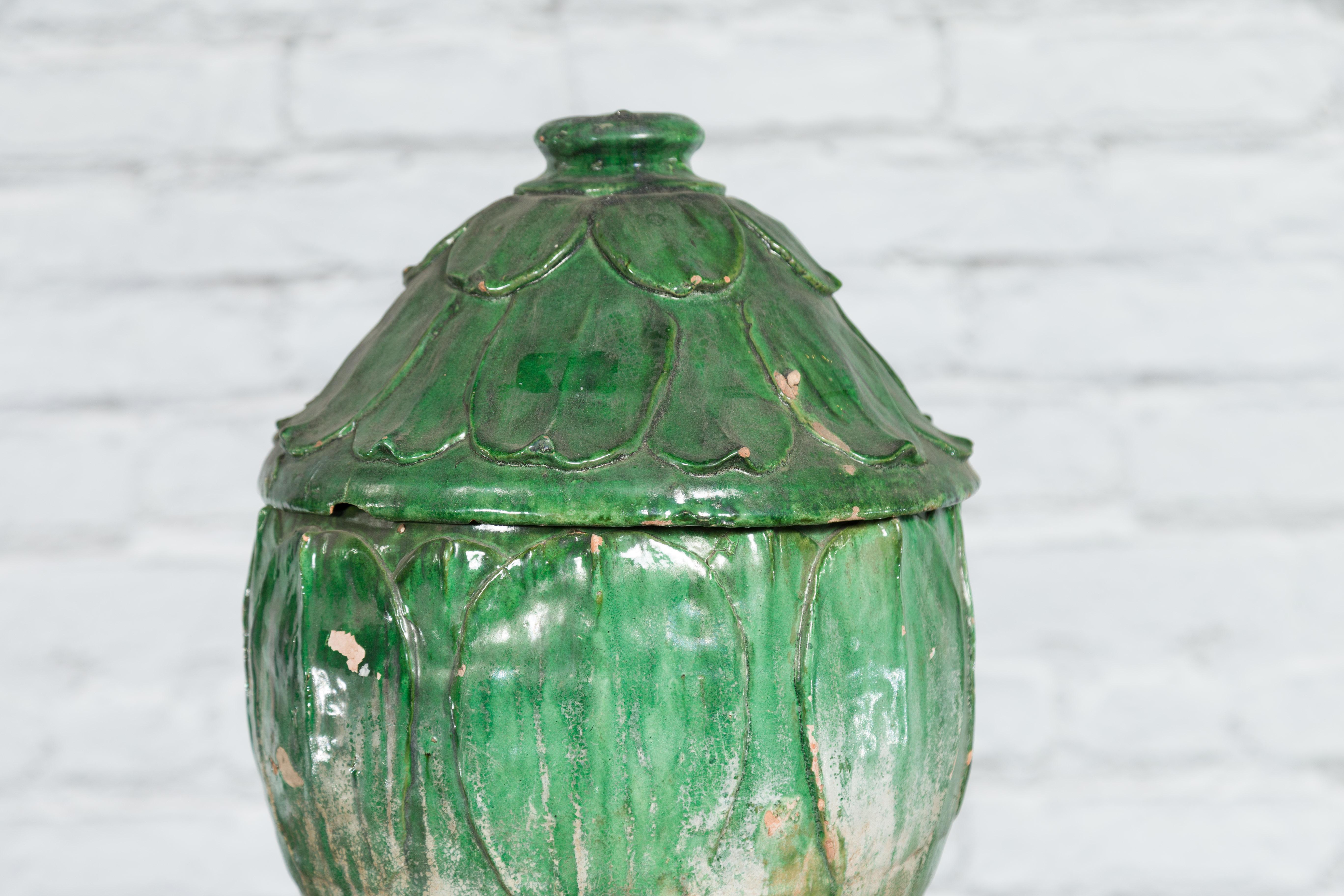 Terracotta 14th Century Yuan Dynasty leaf-green glazed lotus burial jar For Sale