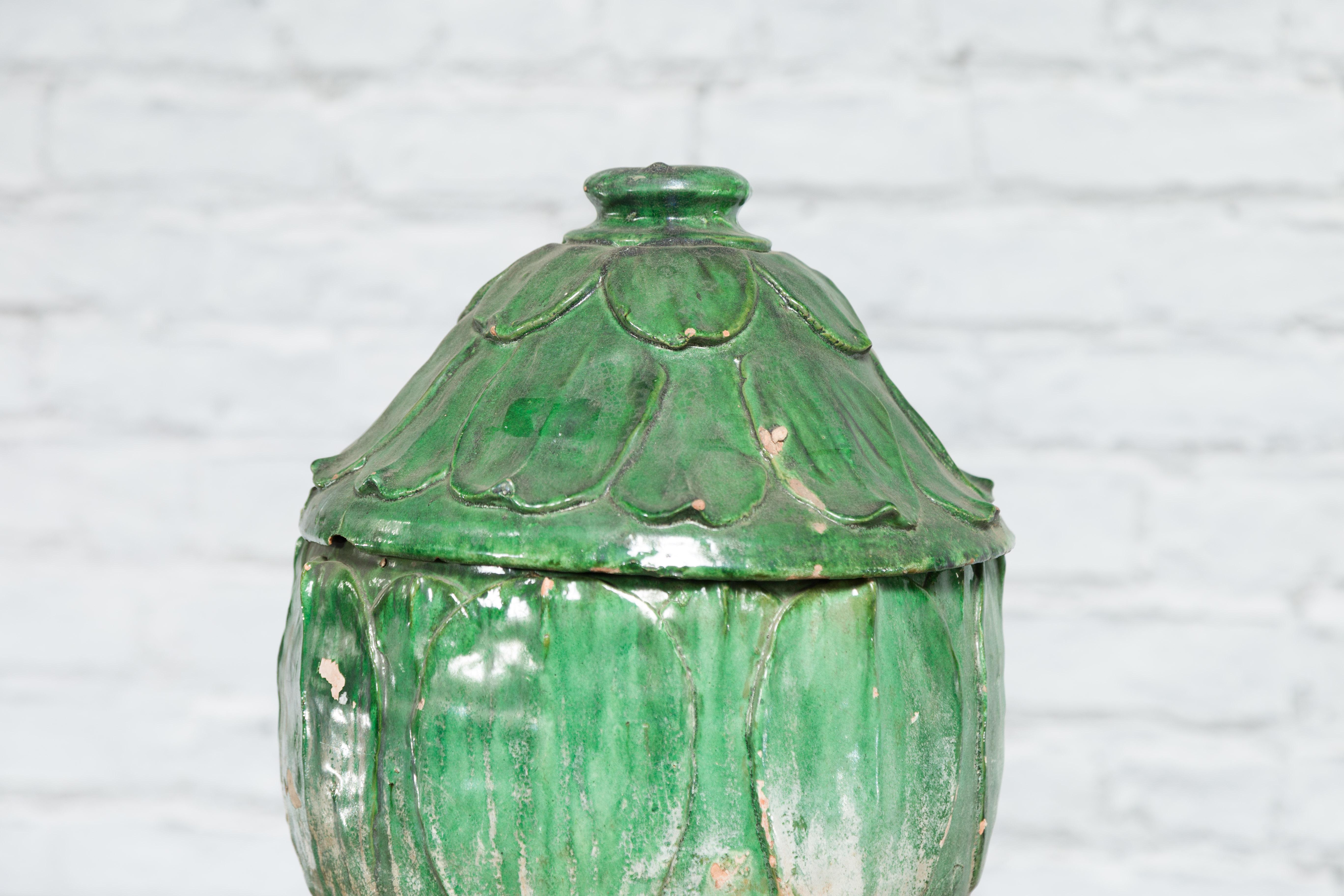 Glazed 14th Century Yuan Dynasty leaf-green glazed lotus burial jar