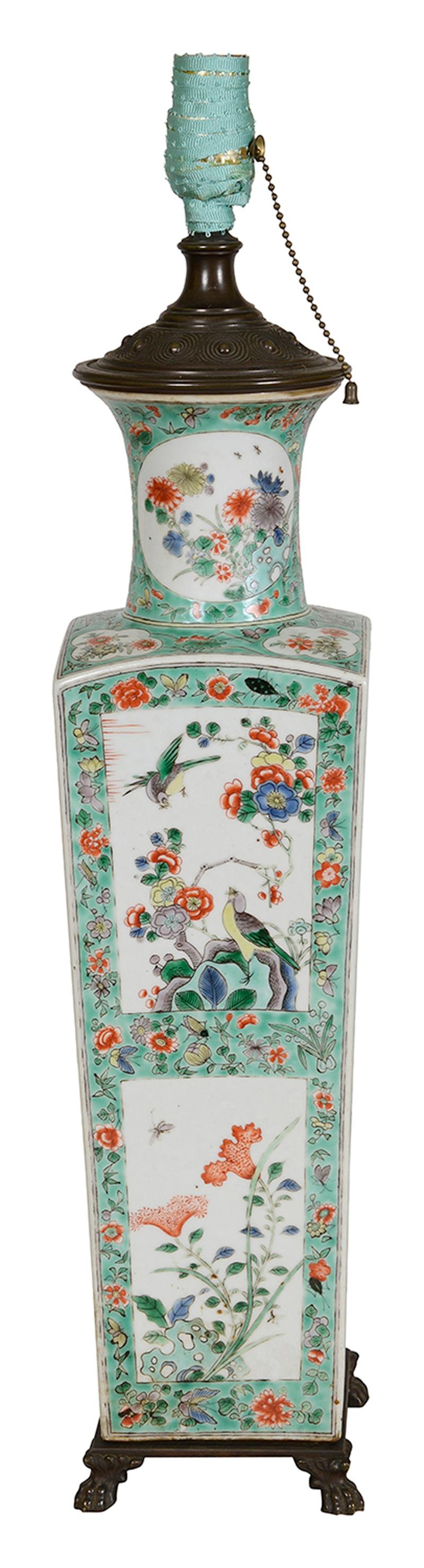 This exquisite 18th-century style Chinese Famille Verte vase has been elegantly transformed into a lamp, showcasing the intricate artistry and vibrant colours characteristic of the period. The vase features a rectangular shape adorned with detailed