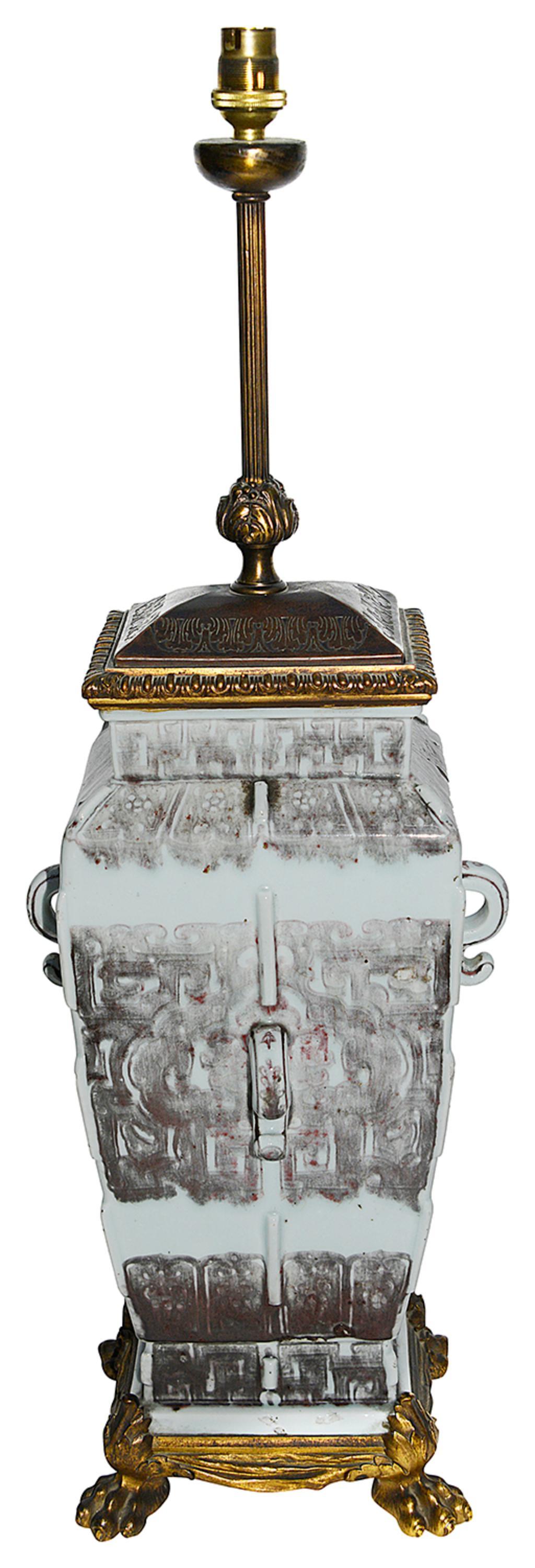 An impressive Chinese 18th Century style, Celadon porcelain vase / lamp, having classical oriental motif hand painted decoration to the whole, and scrolling handles to each side. Mounted on a wonderful gilded ormolu base, terminating in claw feet,