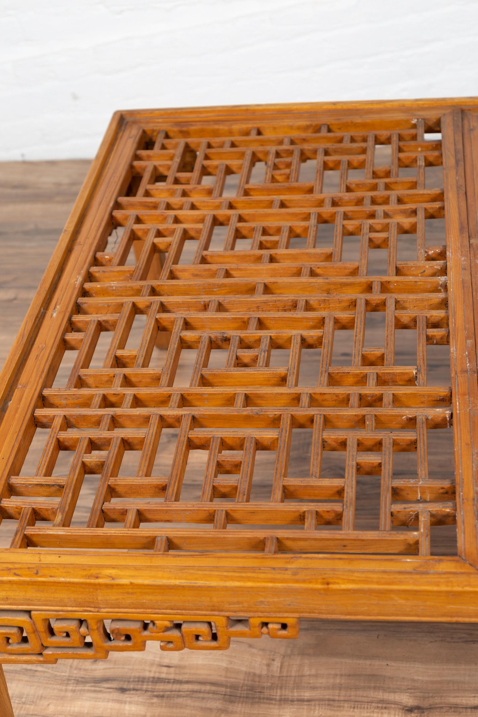 20th Century Chinese Elmwood Square Coffee Table with Open Fretwork and Horse-Hoof Legs For Sale