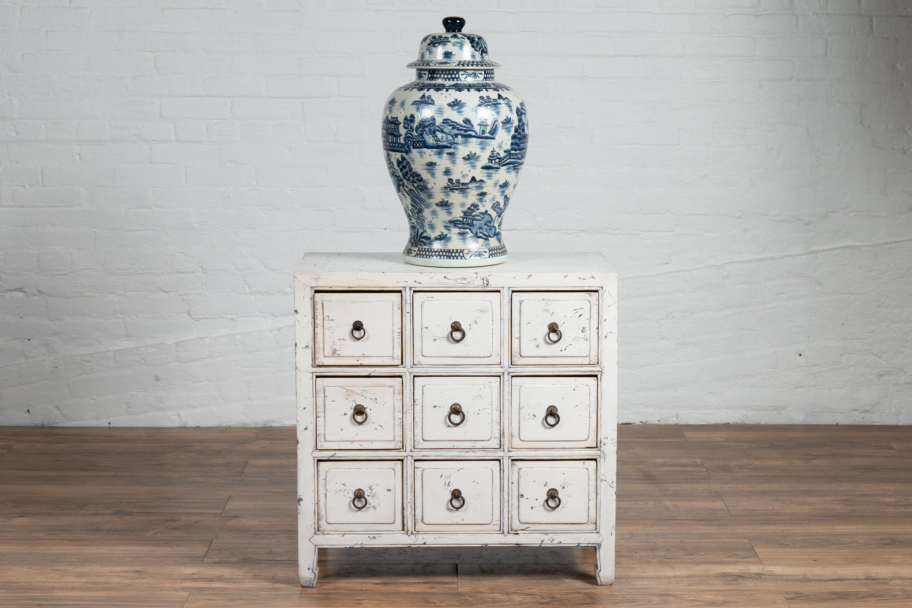 Chinese 1950s White Painted Nine-Drawer Apothecary Chest with Distressed Finish 5