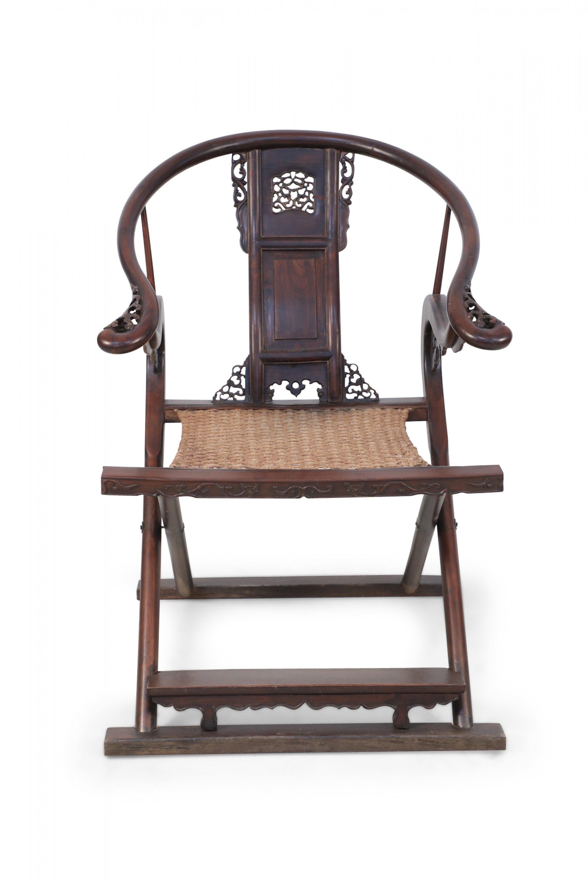 Hardwood Chinese 19th Century Carved Horseshoe-Back Folding Chair For Sale