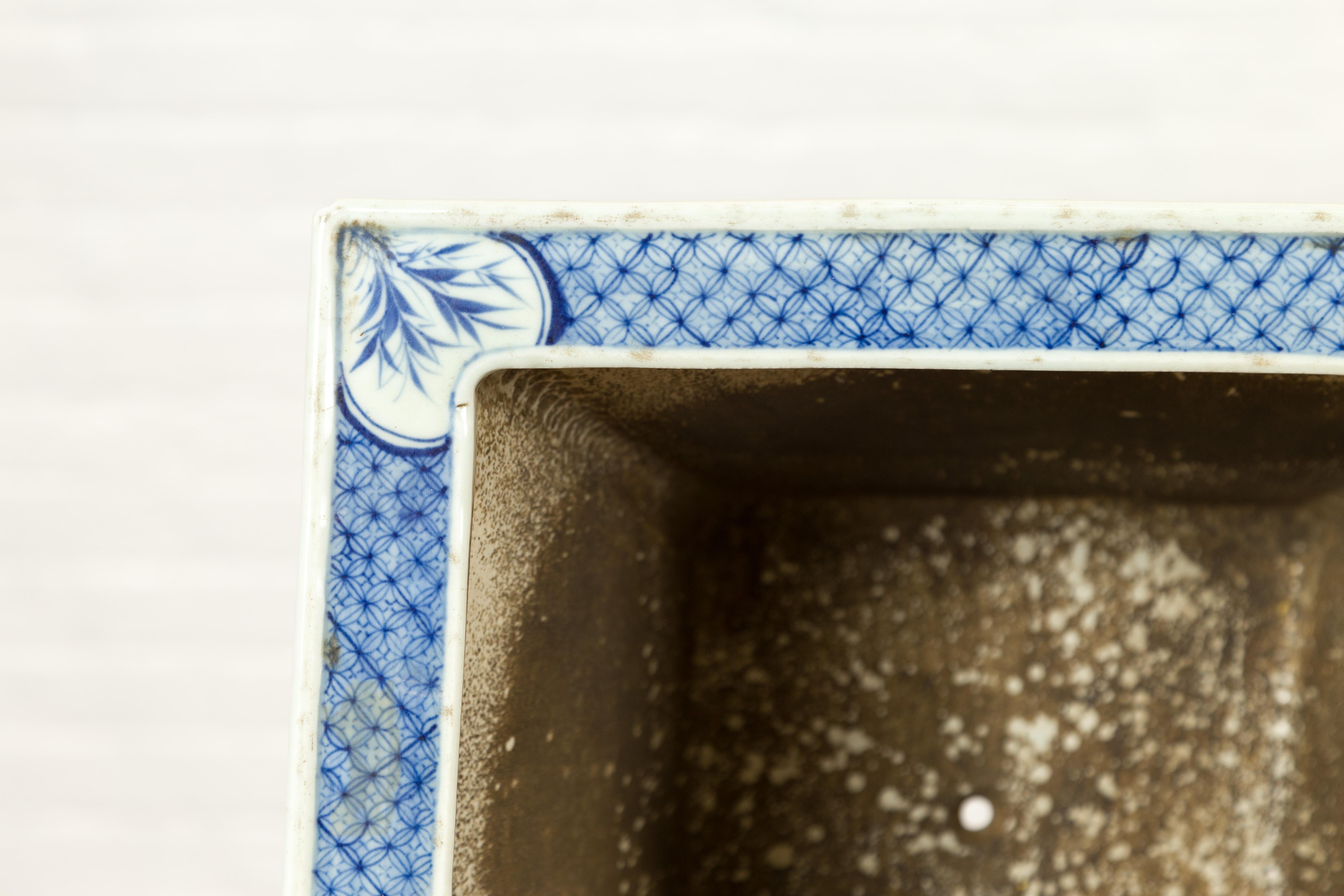 Chinese 19th Century Qing Dynasty Blue and White Planter with Floral Décor 8