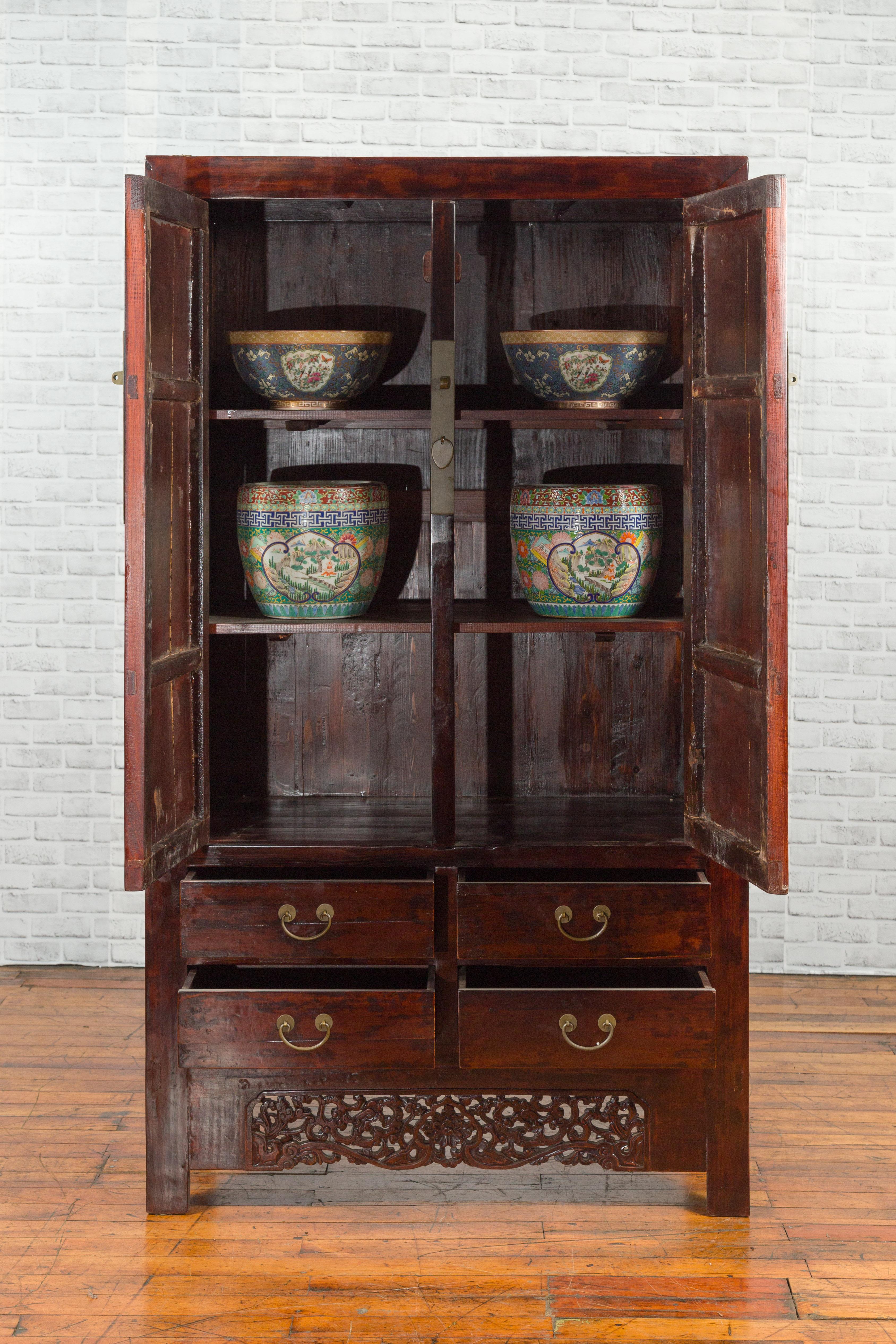 Wood Chinese 19th Century Qing Dynasty Brown Lacquered Cabinet with Carved Apron For Sale