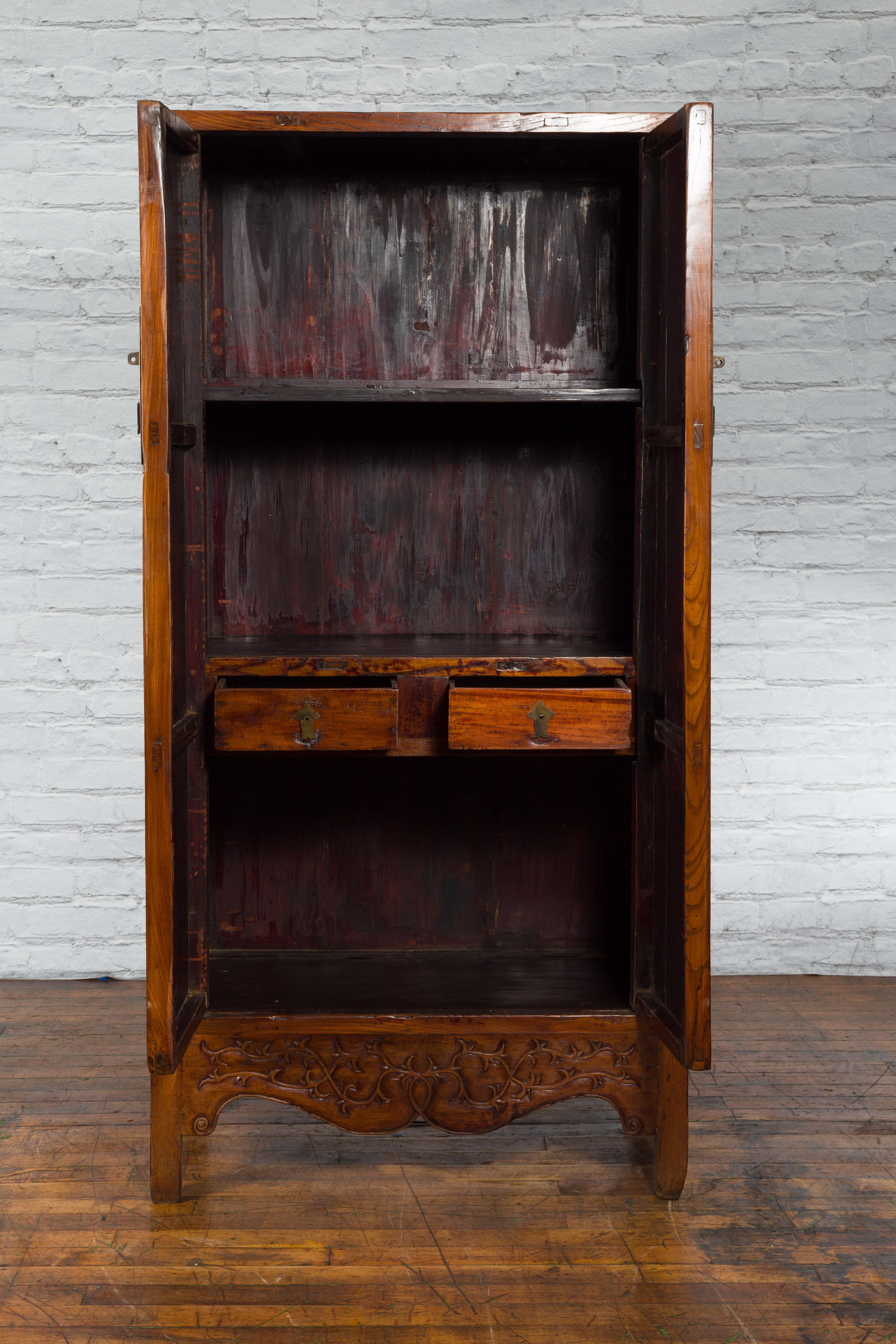 Chinese 19th Century Qing Dynasty Cabinet with Brown Finish and Carved Apron For Sale 1