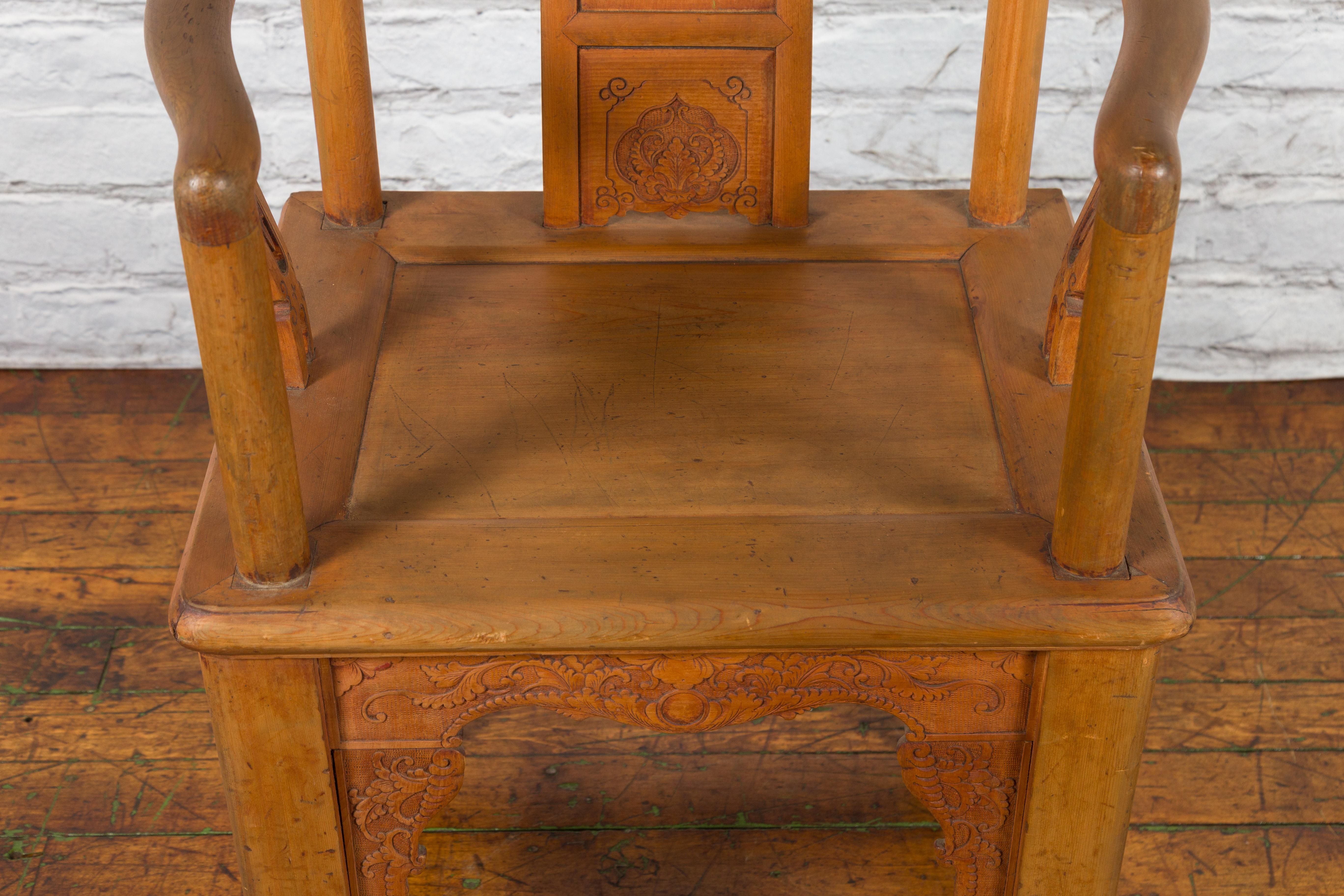 Chinese 19th Century Qing Dynasty Elm Armchair with Carved Traditional Motifs For Sale 16
