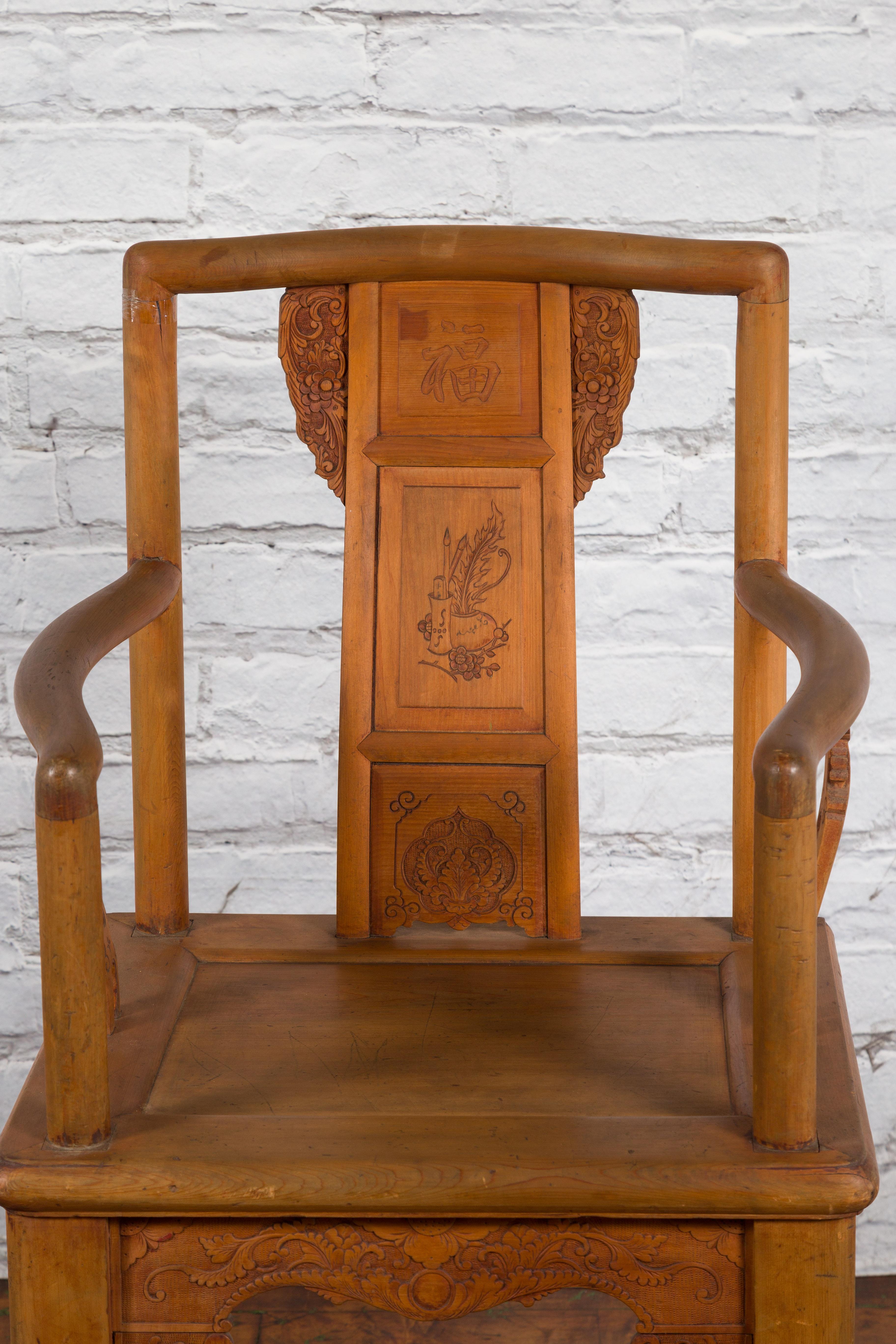 Chinese 19th Century Qing Dynasty Elm Armchair with Carved Traditional Motifs In Good Condition For Sale In Yonkers, NY