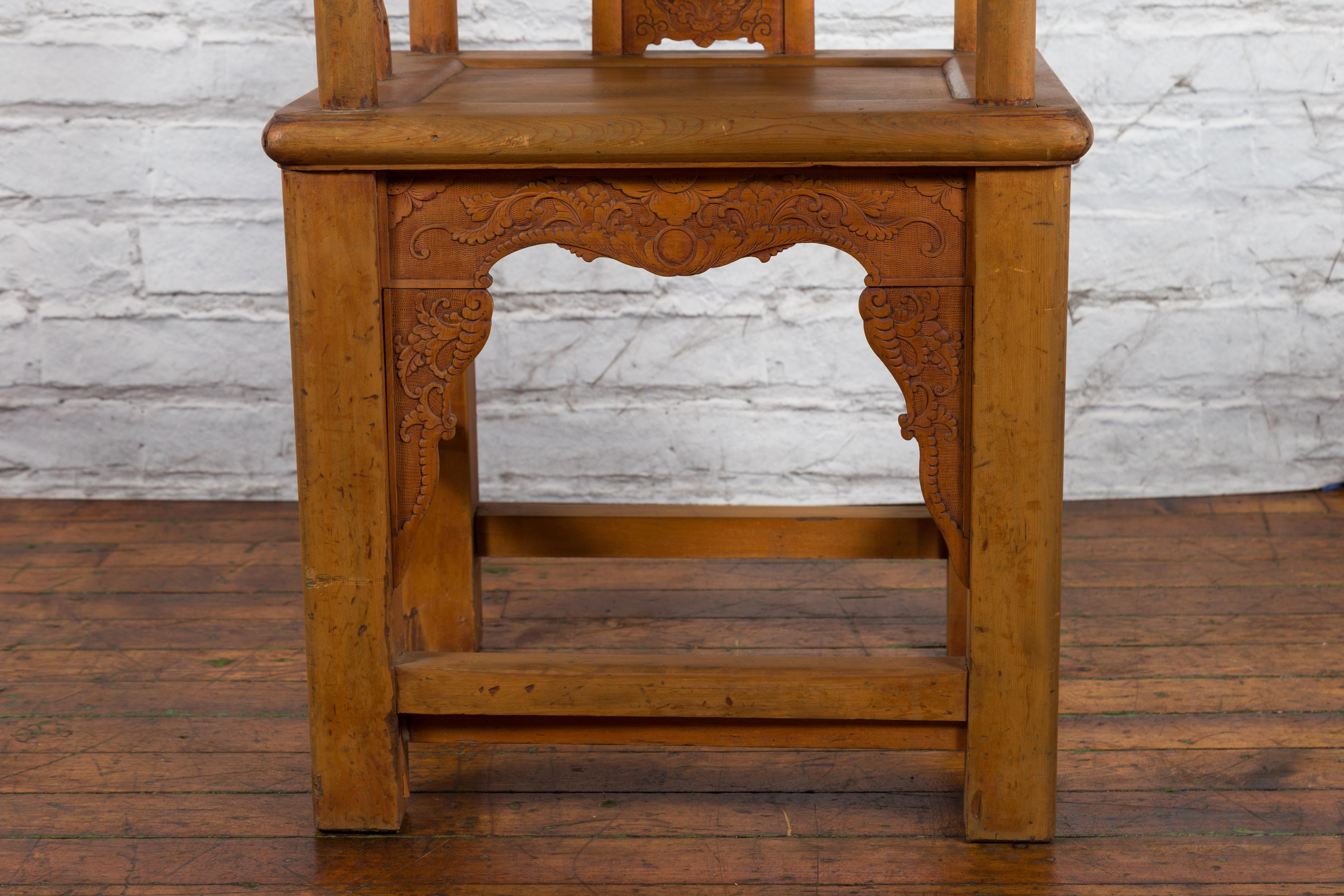 Chinese 19th Century Qing Dynasty Elm Armchair with Carved Traditional Motifs For Sale 4