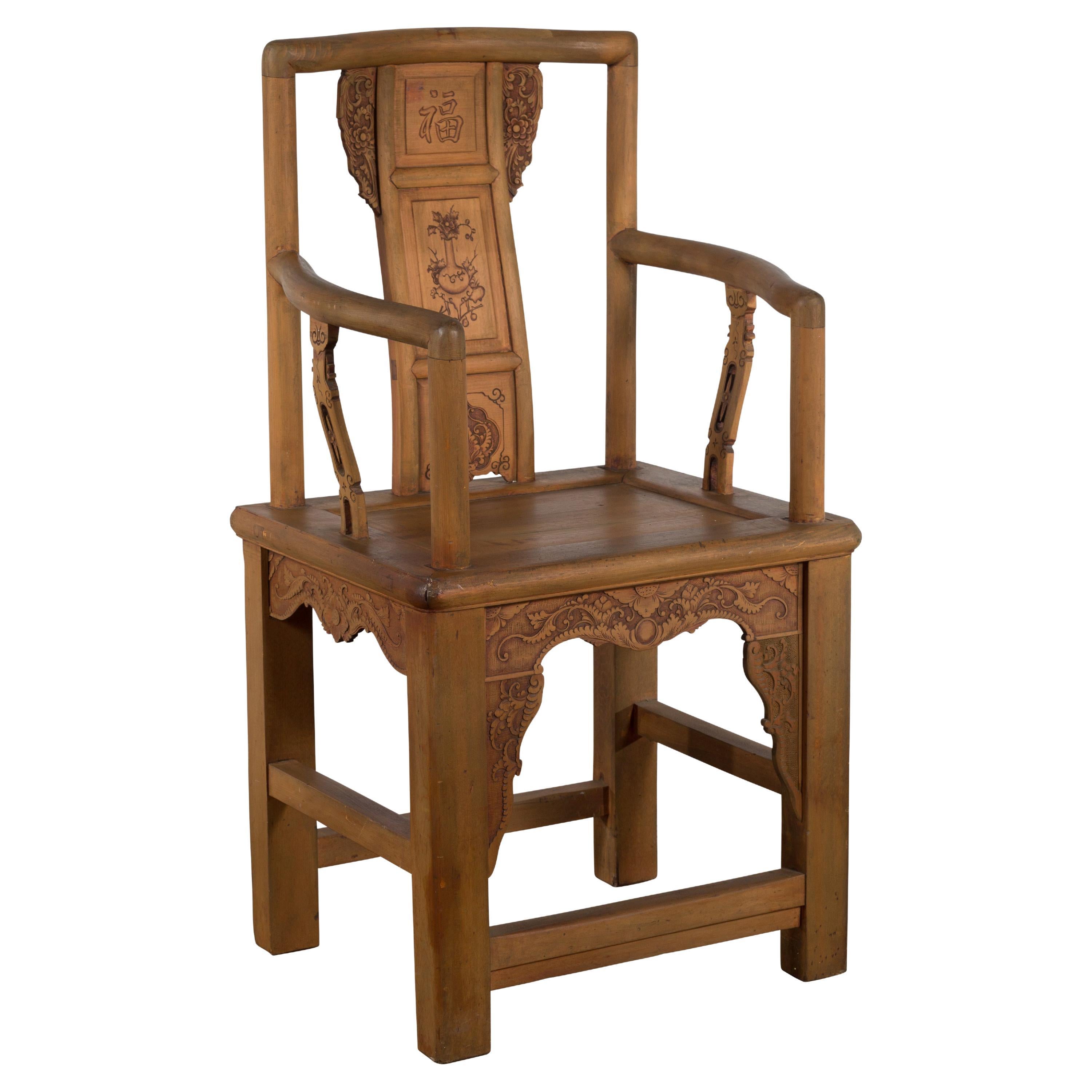Chinese 19th Century Qing Dynasty Elm Armchair with Carved Traditional Motifs For Sale