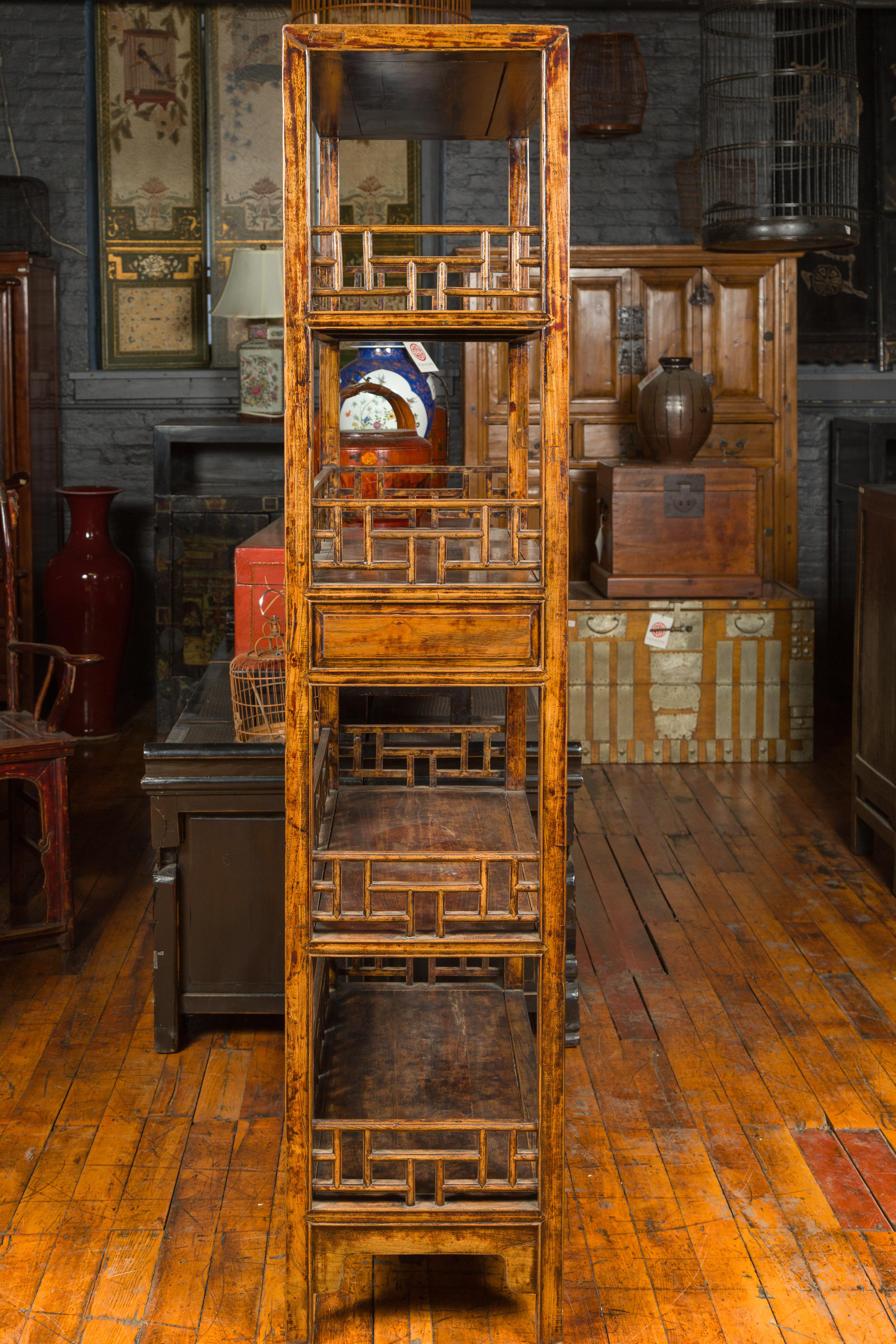 Chinese 19th Century Qing Dynasty Elm Bookcase with Fretwork Sides and Drawers 5