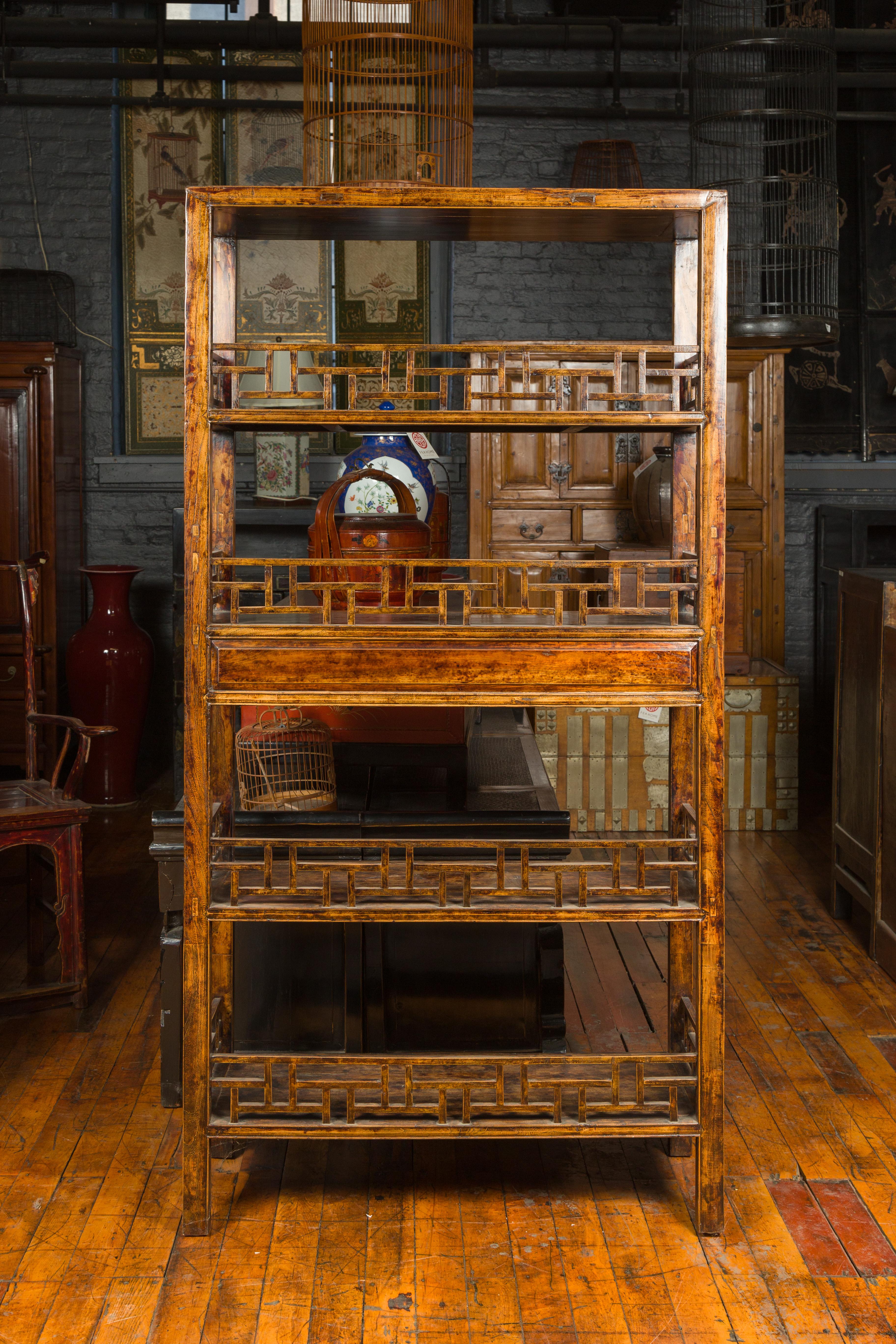 Chinese 19th Century Qing Dynasty Elm Bookcase with Fretwork Sides and Drawers 8