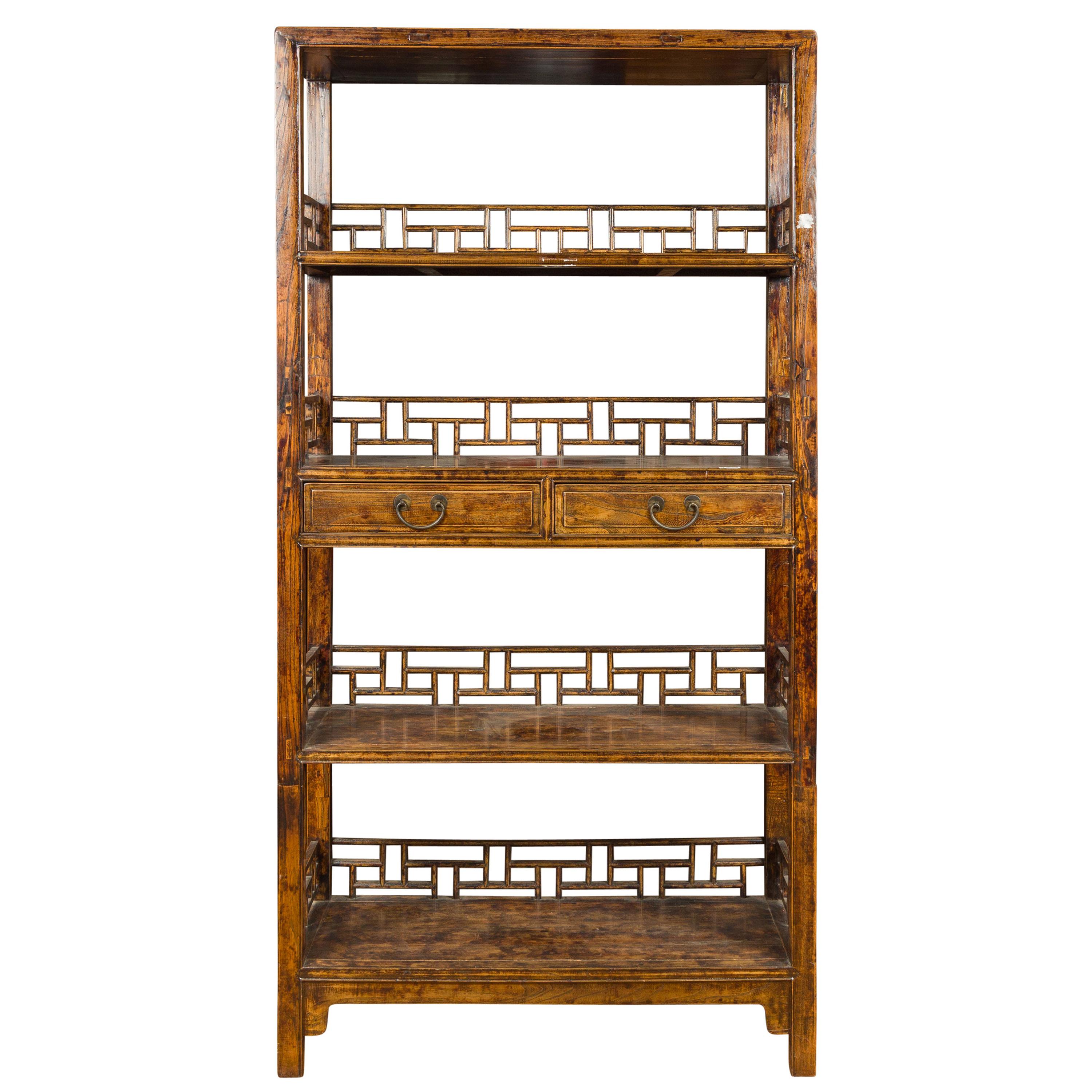 Chinese 19th Century Qing Dynasty Elm Bookcase with Fretwork Sides and Drawers