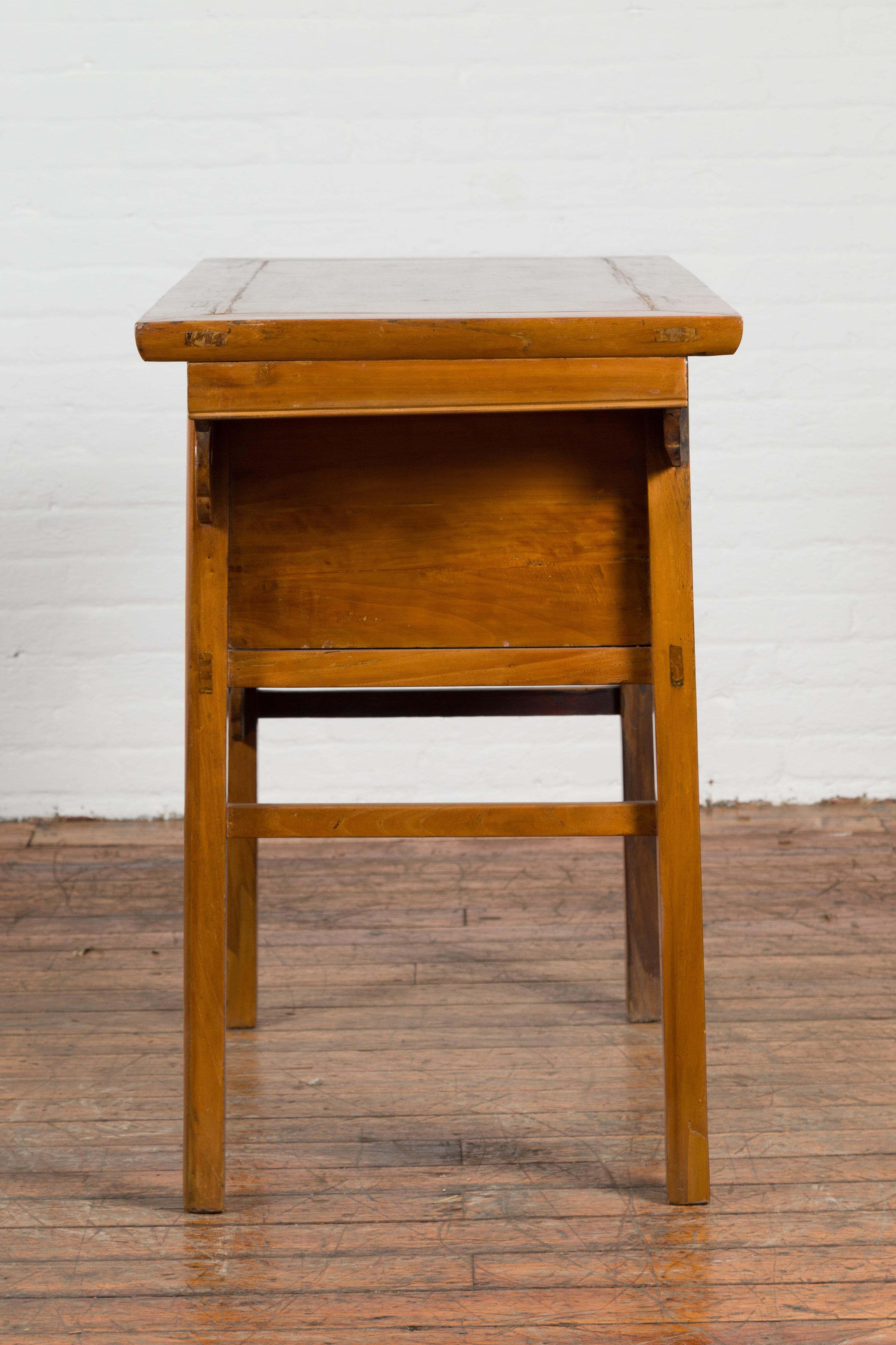 Chinese 19th Century Qing Dynasty Elm Table with Carved Spandrels and Drawers For Sale 8