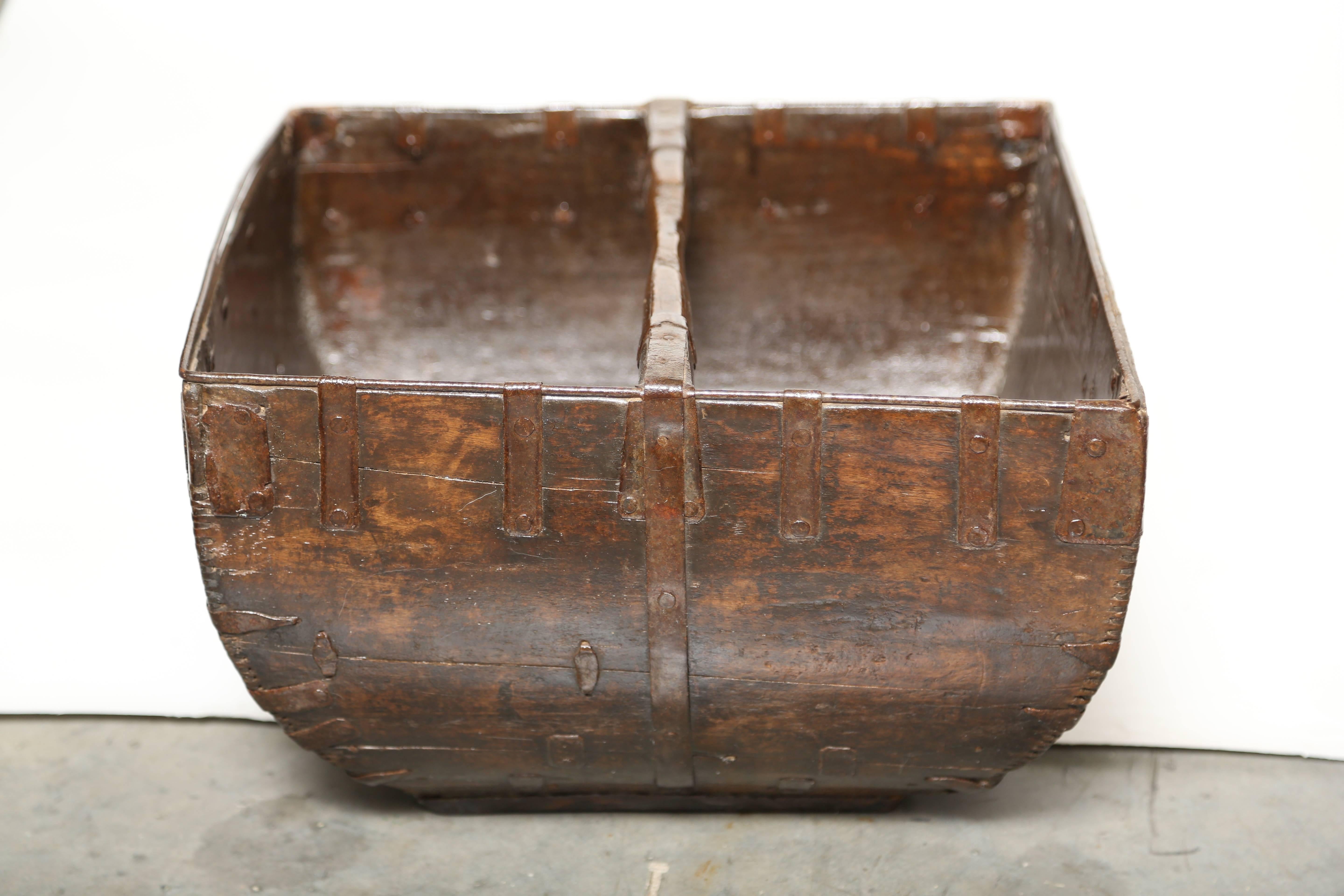 Chinese 19th century rice basket or carrier. Wood construction with metal fasteners creating a wonderful patina. It would make a great magazine holder or to help organize anything at home.