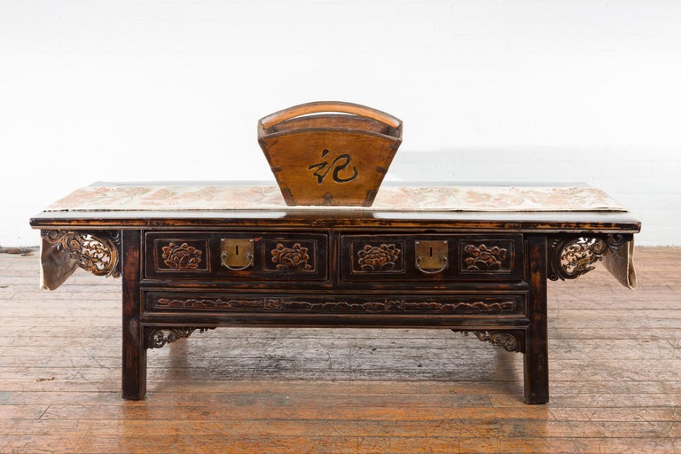 An antique Chinese wood carrying basket from the 19th century, with calligraphy and handle. Created in China during the Qing Dynasty, this carrying basket features a square tapering body adorned with black calligraphy on two sides. Showcasing a
